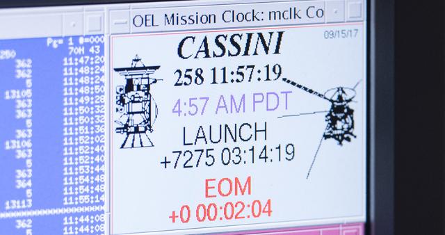 A computer screen in mission control displays mission elapsed time for Cassini minutes after the spacecraft plunged into Saturn's atmosphere, Friday, Sept. 15, 2017 at NASA's Jet Propulsion Laboratory in Pasadena, California. Since its arrival in 2004, the Cassini-Huygens mission has been a discovery machine, revolutionizing our knowledge of the Saturn system and captivating us with data and images never before obtained with such detail and clarity. On Sept. 15, 2017, operators will deliberately plunge the spacecraft into Saturn, as Cassini gathered science until the end. Loss of contact with the Cassini spacecraft occurred at 7:55 a.m. EDT (4:55 a.m. PDT). The “plunge” ensures Saturn’s moons will remain pristine for future exploration. During Cassini’s final days, mission team members from all around the world gathered at NASA’s Jet Propulsion Laboratory, Pasadena, California, to celebrate the achievements of this historic mission. Photo Credit: (NASA/Joel Kowsky)