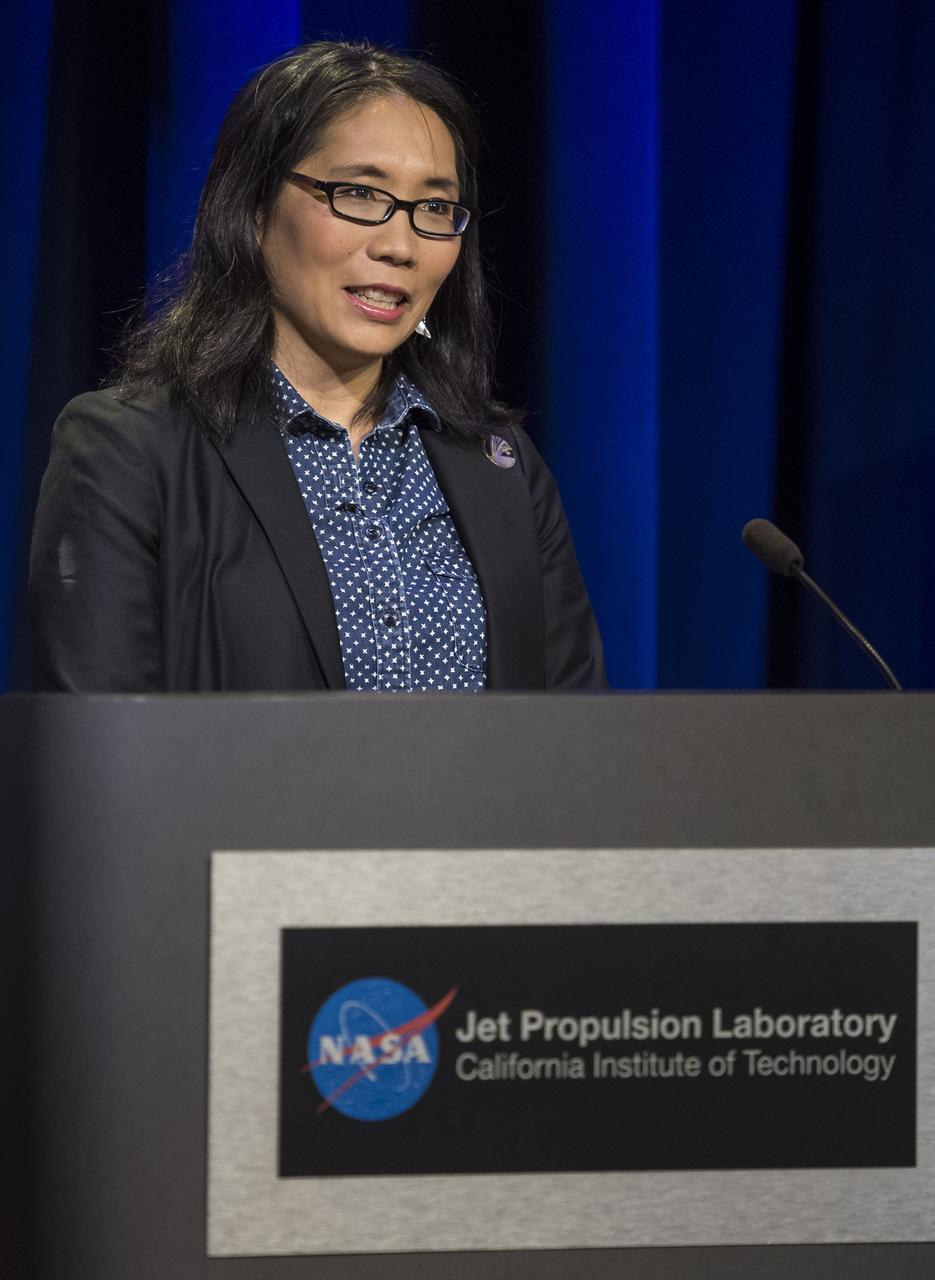 Jia-Rui Cook, media relations representative at JPL, moderates a press conference held after the end of the Cassini mission, Friday, Sept. 15, 2017 at NASA's Jet Propulsion Laboratory in Pasadena, California. Since its arrival in 2004, the Cassini-Huygens mission has been a discovery machine, revolutionizing our knowledge of the Saturn system and captivating us with data and images never before obtained with such detail and clarity. On Sept. 15, 2017, operators deliberately plunged the spacecraft into Saturn, as Cassini gathered science until the end. Loss of contact with the Cassini spacecraft occurred at 7:55 a.m. EDT (4:55 a.m. PDT). The “plunge” ensures Saturn’s moons will remain pristine for future exploration. During Cassini’s final days, mission team members from all around the world gathered at NASA’s Jet Propulsion Laboratory, Pasadena, California, to celebrate the achievements of this historic mission. Photo Credit: (NASA/Joel Kowsky)