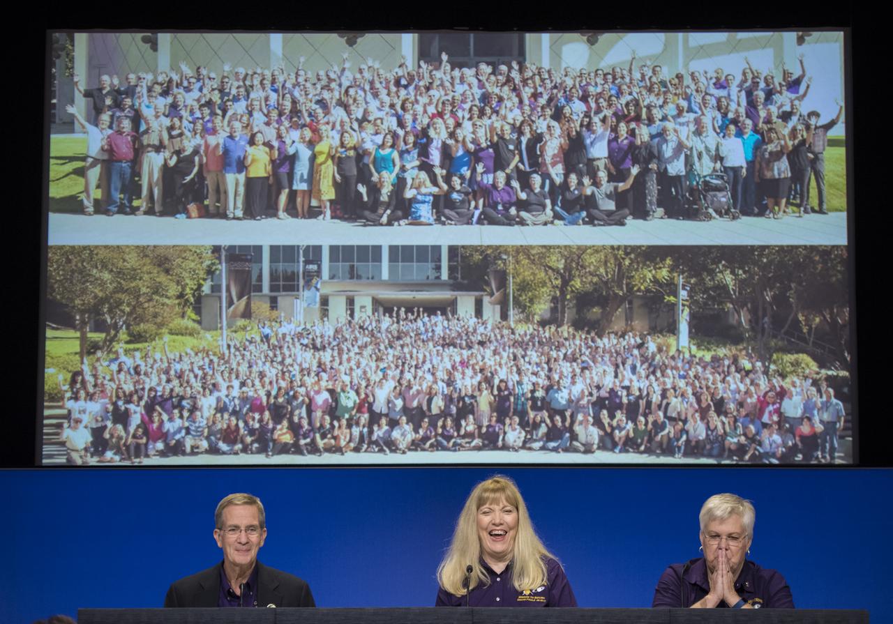 Cassini program manager at JPL, Earl Maize, left, Cassini project scientist at JPL, Linda Spilker, center, and spacecraft operations team manager for the Cassini mission at Saturn, Julie Webster, right, react to seeing images of the Cassini science and engineering teams during a press conference held after the end of the Cassini mission, Friday, Sept. 15, 2017 at NASA's Jet Propulsion Laboratory in Pasadena, California. Since its arrival in 2004, the Cassini-Huygens mission has been a discovery machine, revolutionizing our knowledge of the Saturn system and captivating us with data and images never before obtained with such detail and clarity. On Sept. 15, 2017, operators deliberately plunged the spacecraft into Saturn, as Cassini gathered science until the end. Loss of contact with the Cassini spacecraft occurred at 7:55 a.m. EDT (4:55 a.m. PDT). The “plunge” ensures Saturn’s moons will remain pristine for future exploration. During Cassini’s final days, mission team members from all around the world gathered at NASA’s Jet Propulsion Laboratory, Pasadena, California, to celebrate the achievements of this historic mission. Photo Credit: (NASA/Joel Kowsky)