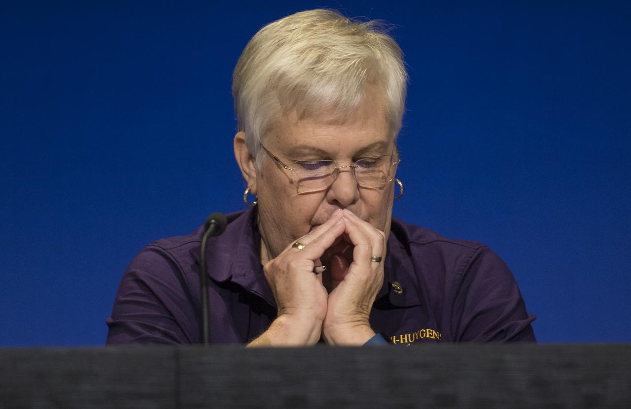 Spacecraft operations team manager for the Cassini mission at Saturn, Julie Webster is seen during a press conference held after the end of the Cassini mission, Friday, Sept. 15, 2017 at NASA's Jet Propulsion Laboratory in Pasadena, California. Since its arrival in 2004, the Cassini-Huygens mission has been a discovery machine, revolutionizing our knowledge of the Saturn system and captivating us with data and images never before obtained with such detail and clarity. On Sept. 15, 2017, operators deliberately plunged the spacecraft into Saturn, as Cassini gathered science until the end. Loss of contact with the Cassini spacecraft occurred at 7:55 a.m. EDT (4:55 a.m. PDT). The “plunge” ensures Saturn’s moons will remain pristine for future exploration. During Cassini’s final days, mission team members from all around the world gathered at NASA’s Jet Propulsion Laboratory, Pasadena, California, to celebrate the achievements of this historic mission. Photo Credit: (NASA/Joel Kowsky)