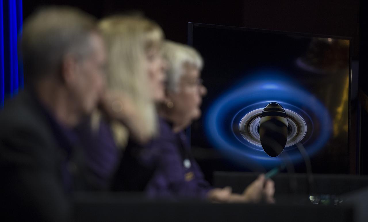 An image of Saturn is seen on a monitor during a press conference held after the end of the Cassini mission, Friday, Sept. 15, 2017 at NASA's Jet Propulsion Laboratory in Pasadena, California. Since its arrival in 2004, the Cassini-Huygens mission has been a discovery machine, revolutionizing our knowledge of the Saturn system and captivating us with data and images never before obtained with such detail and clarity. On Sept. 15, 2017, operators deliberately plunged the spacecraft into Saturn, as Cassini gathered science until the end. Loss of contact with the Cassini spacecraft occurred at 7:55 a.m. EDT (4:55 a.m. PDT). The “plunge” ensures Saturn’s moons will remain pristine for future exploration. During Cassini’s final days, mission team members from all around the world gathered at NASA’s Jet Propulsion Laboratory, Pasadena, California, to celebrate the achievements of this historic mission. Photo Credit: (NASA/Joel Kowsky)