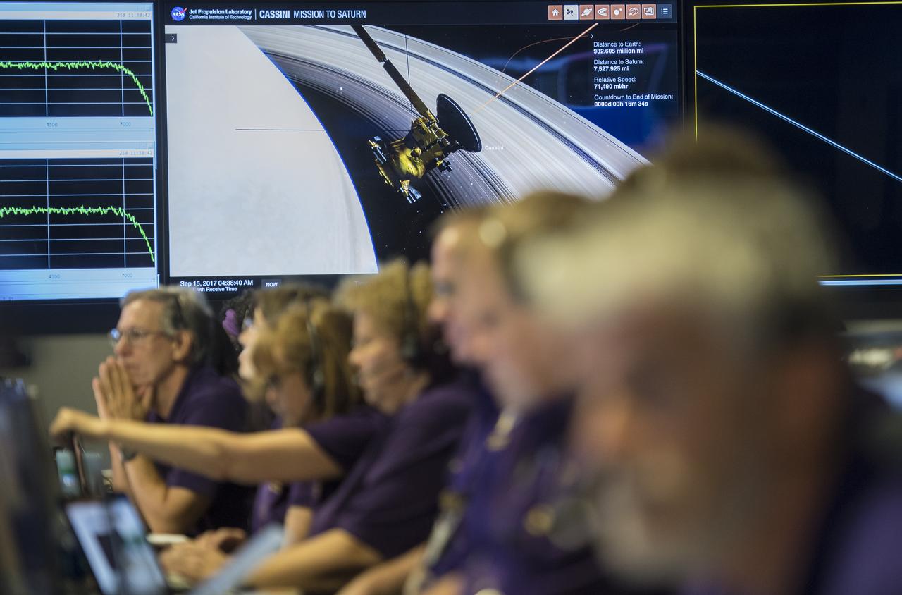 A monitor in the mission control room shows a visualization of Cassini as it makes its final plunge into Saturn, Friday, Sept. 15, 2017 at NASA's Jet Propulsion Laboratory in Pasadena, California. Since its arrival in 2004, the Cassini-Huygens mission has been a discovery machine, revolutionizing our knowledge of the Saturn system and captivating us with data and images never before obtained with such detail and clarity. On Sept. 15, 2017, operators deliberately plunged the spacecraft into Saturn, as Cassini gathered science until the end. Loss of contact with the Cassini spacecraft occurred at 7:55 a.m. EDT (4:55 a.m. PDT). The “plunge” ensures Saturn’s moons will remain pristine for future exploration. During Cassini’s final days, mission team members from all around the world gathered at NASA’s Jet Propulsion Laboratory, Pasadena, California, to celebrate the achievements of this historic mission. Photo Credit: (NASA/Joel Kowsky)