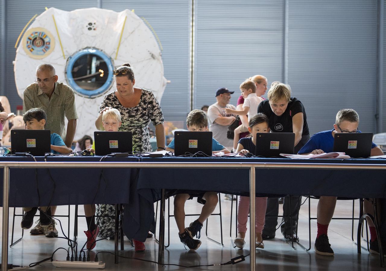 Participants create digital 3D models using Autodesk Tinkercad in the Two for the Crew Challenge at a pop-up makerspace held by Future Engineers, with support from NASA and The American Society of Mechanical Engineers (ASME), at the Steven F. Udvar-Hazy Center, Thursday, September 21, 2017 in Chantilly, Virginia. Participants had the opportunity to create digital 3D models and watch objects being printed with Makerbot 3D printers. The winner of the Two for the Crew challenge will have their design printed on the International Space Station. Photo Credit: (NASA/Aubrey Gemignani)