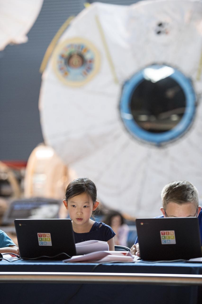 A participant creates digital 3D models using Autodesk Tinkercad in the Two for the Crew Challenge at a pop-up makerspace held by Future Engineers, with support from NASA and The American Society of Mechanical Engineers (ASME), at the Steven F. Udvar-Hazy Center, Thursday, September 21, 2017 in Chantilly, Virginia. Participants had the opportunity to create digital 3D models and watch objects being printed with Makerbot 3D printers. Photo Credit: (NASA/Aubrey Gemignani)