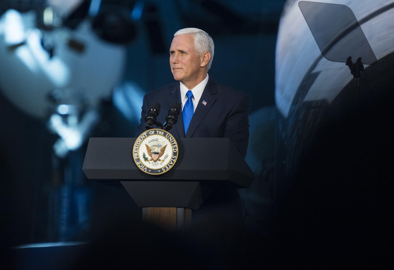 Vice President Mike Pence delivers opening remarks during the National Space Council's first meeting, Thursday, Oct. 5, 2017 at the Smithsonian National Air and Space Museum's Steven F. Udvar-Hazy Center in Chantilly, Va. The National Space Council, chaired by Vice President Mike Pence heard testimony from representatives from civil space, commercial space, and national security space industry representatives.  Photo Credit: (NASA/Joel Kowsky)