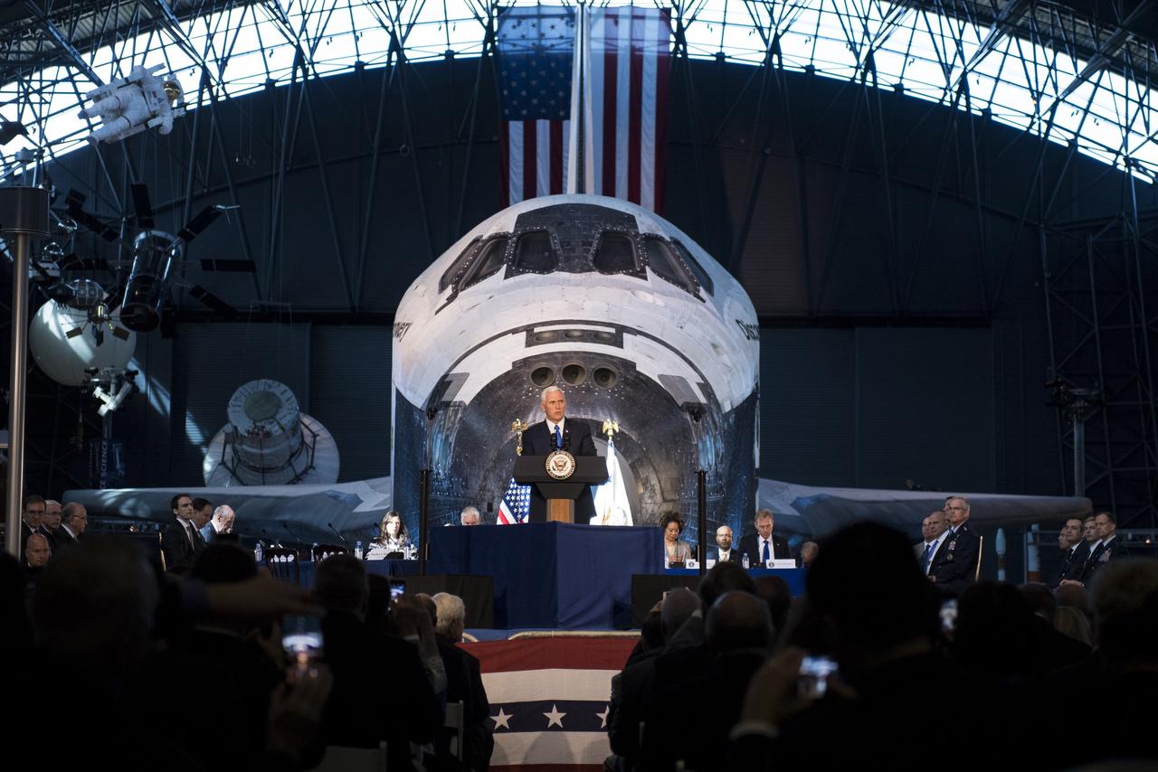 Vice President Mike Pence delivers opening remarks during the National Space Council's first meeting, Thursday, Oct. 5, 2017 at the Smithsonian National Air and Space Museum's Steven F. Udvar-Hazy Center in Chantilly, Va. The National Space Council, chaired by Vice President Mike Pence heard testimony from representatives from civil space, commercial space, and national security space industry representatives.  Photo Credit: (NASA/Joel Kowsky)