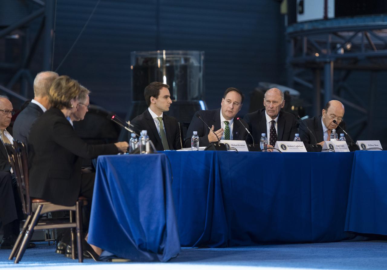 Acting NASA Administrator Robert Lightfoot asks a questions of panelists during the National Space Council's first meeting, Thursday, Oct. 5, 2017 at the Smithsonian National Air and Space Museum's Steven F. Udvar-Hazy Center in Chantilly, Va. The National Space Council, chaired by Vice President Mike Pence heard testimony from representatives from civil space, commercial space, and national security space industry representatives.  Photo Credit: (NASA/Joel Kowsky)