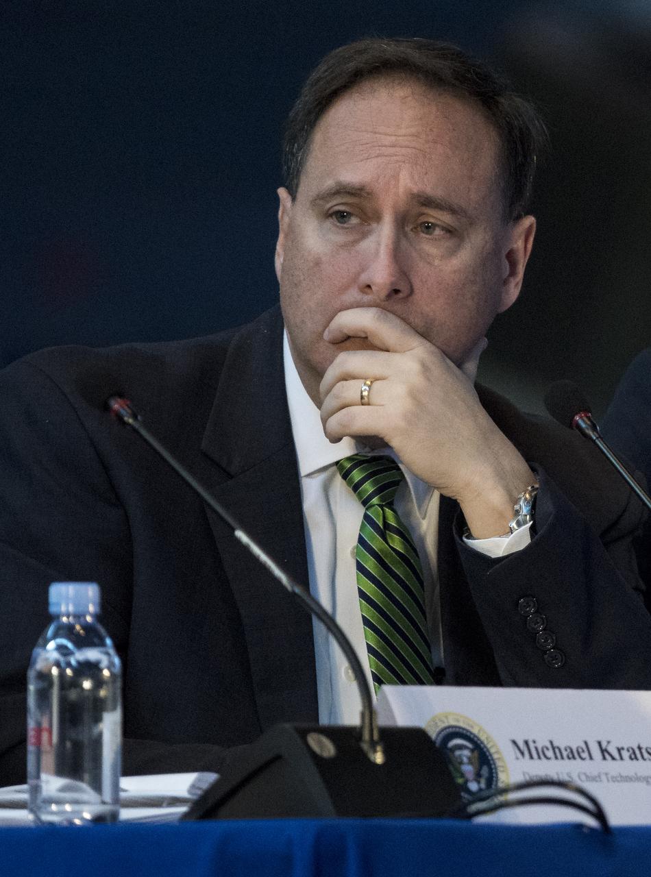 Acting NASA Administrator Robert Lightfoot listens to remarks by panelists during the National Space Council's first meeting, Thursday, Oct. 5, 2017 at the Smithsonian National Air and Space Museum's Steven F. Udvar-Hazy Center in Chantilly, Va. The National Space Council, chaired by Vice President Mike Pence heard testimony from representatives from civil space, commercial space, and national security space industry representatives.  Photo Credit: (NASA/Joel Kowsky)