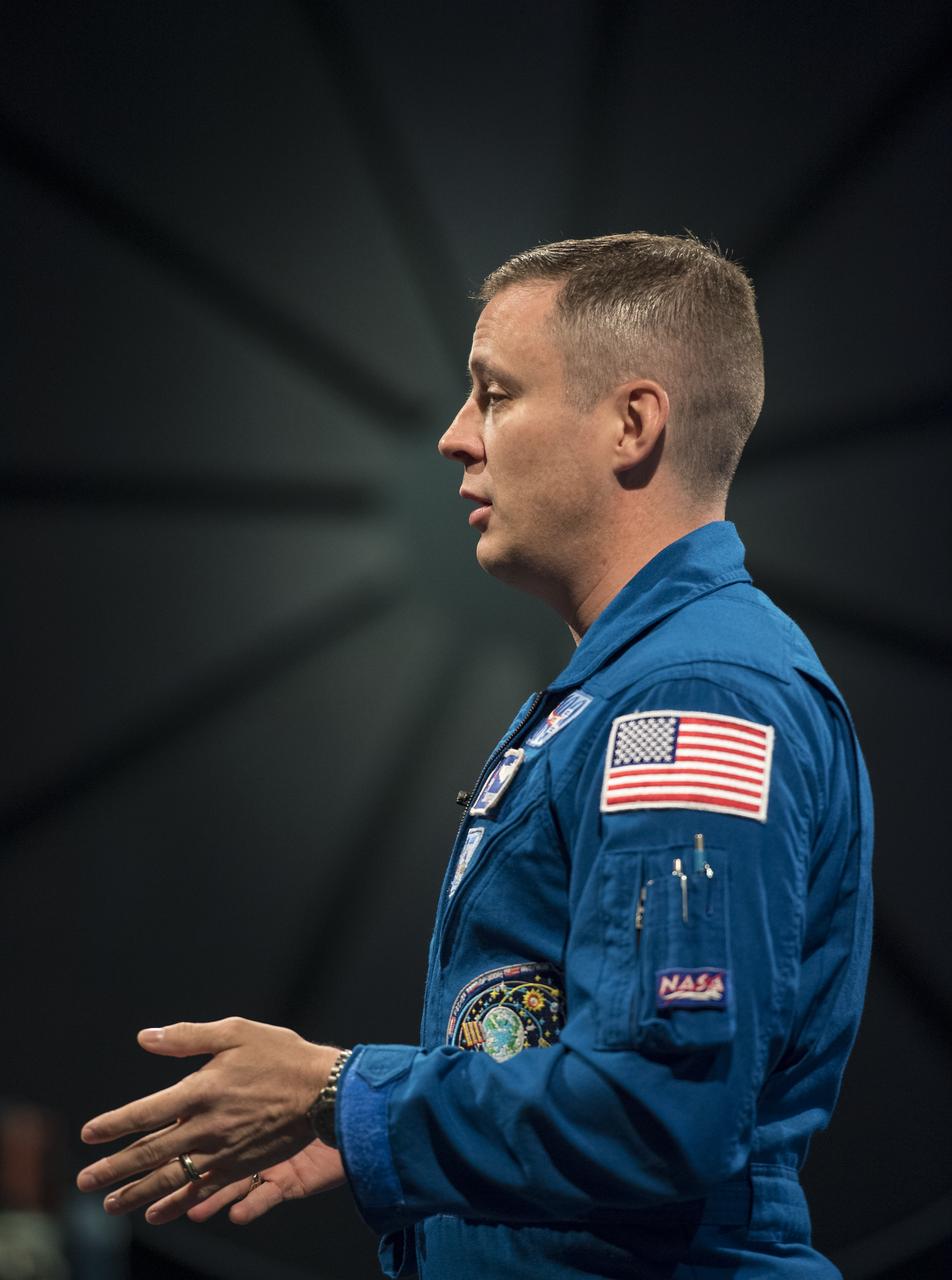 NASA astronaut Jack Fischer speaks about his time onboard the International Space Station (ISS) during Expeditions 51/52, Friday, Nov. 3, 2017 at Smithsonian's National Air and Space Museum in Washington. During Expedition 52, Fischer completed hundreds of scientific experiments and two spacewalks, and concluded his 136-day mission when he landed in a remote area near the town of Zhezkazgan, Kazakhstan in September 2017. Photo Credit: (NASA/Aubrey Gemignani)