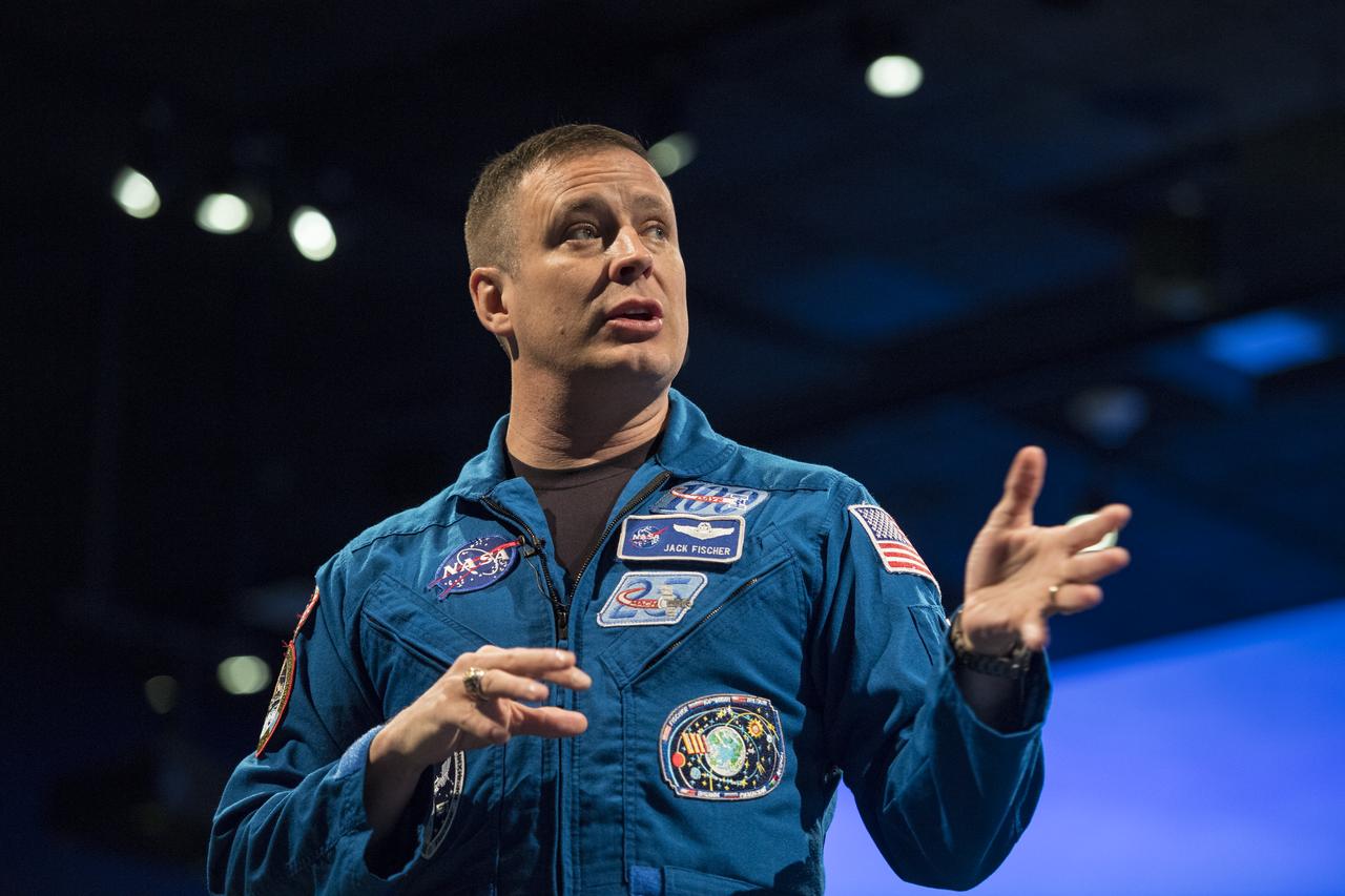 NASA astronaut Jack Fischer speaks about his time onboard the International Space Station (ISS) during Expeditions 51/52, Friday, Nov. 3, 2017 at Smithsonian's National Air and Space Museum in Washington. During Expedition 52, Fischer completed hundreds of scientific experiments and two spacewalks, and concluded his 136-day mission when he landed in a remote area near the town of Zhezkazgan, Kazakhstan in September 2017. Photo Credit: (NASA/Aubrey Gemignani)