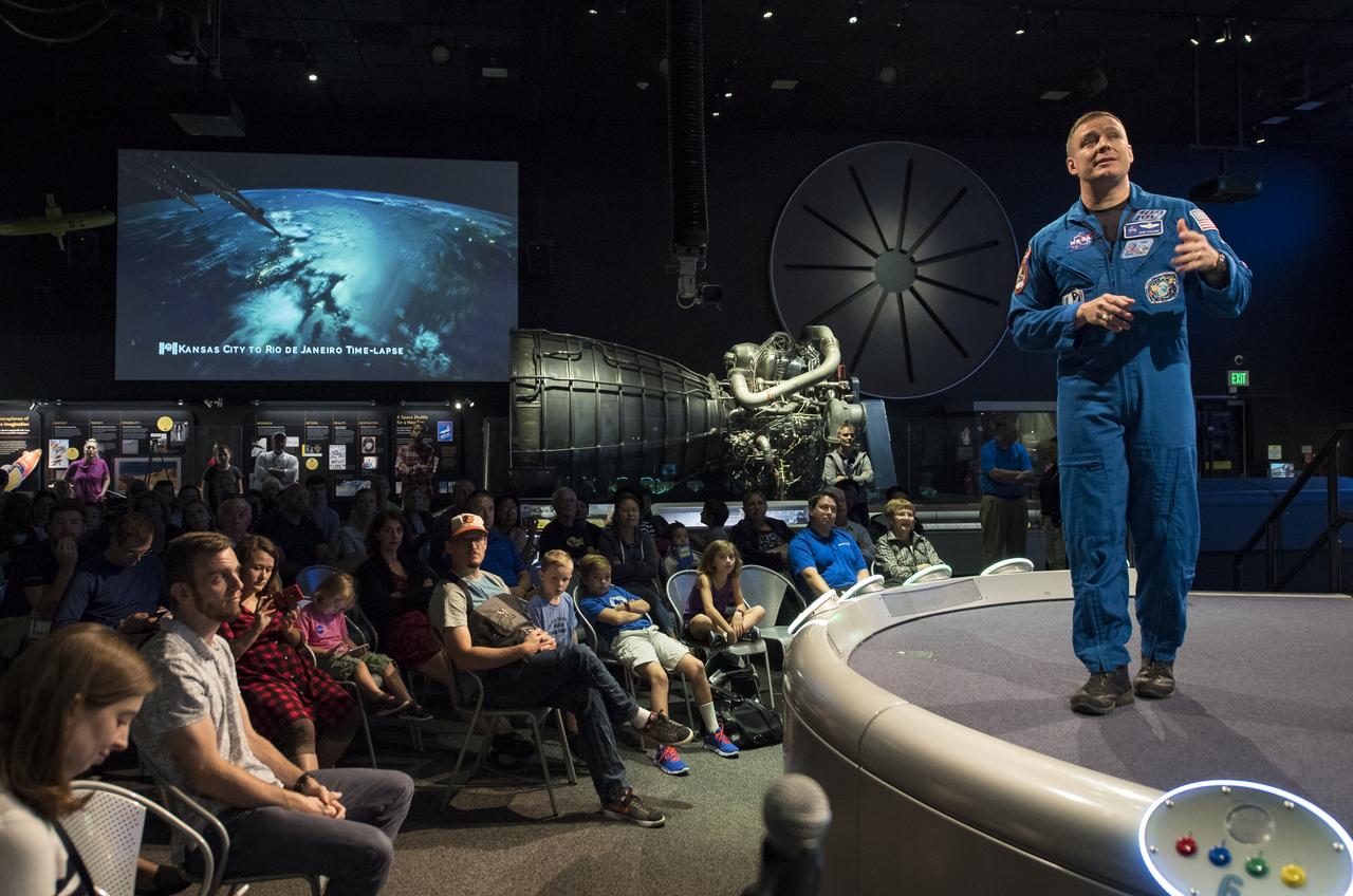 NASA astronaut Jack Fischer speaks about his time onboard the International Space Station (ISS) during Expeditions 51/52, Friday, Nov. 3, 2017 at Smithsonian's National Air and Space Museum in Washington. During Expedition 52, Fischer completed hundreds of scientific experiments and two spacewalks, and concluded his 136-day mission when he landed in a remote area near the town of Zhezkazgan, Kazakhstan in September 2017. Photo Credit: (NASA/Aubrey Gemignani)