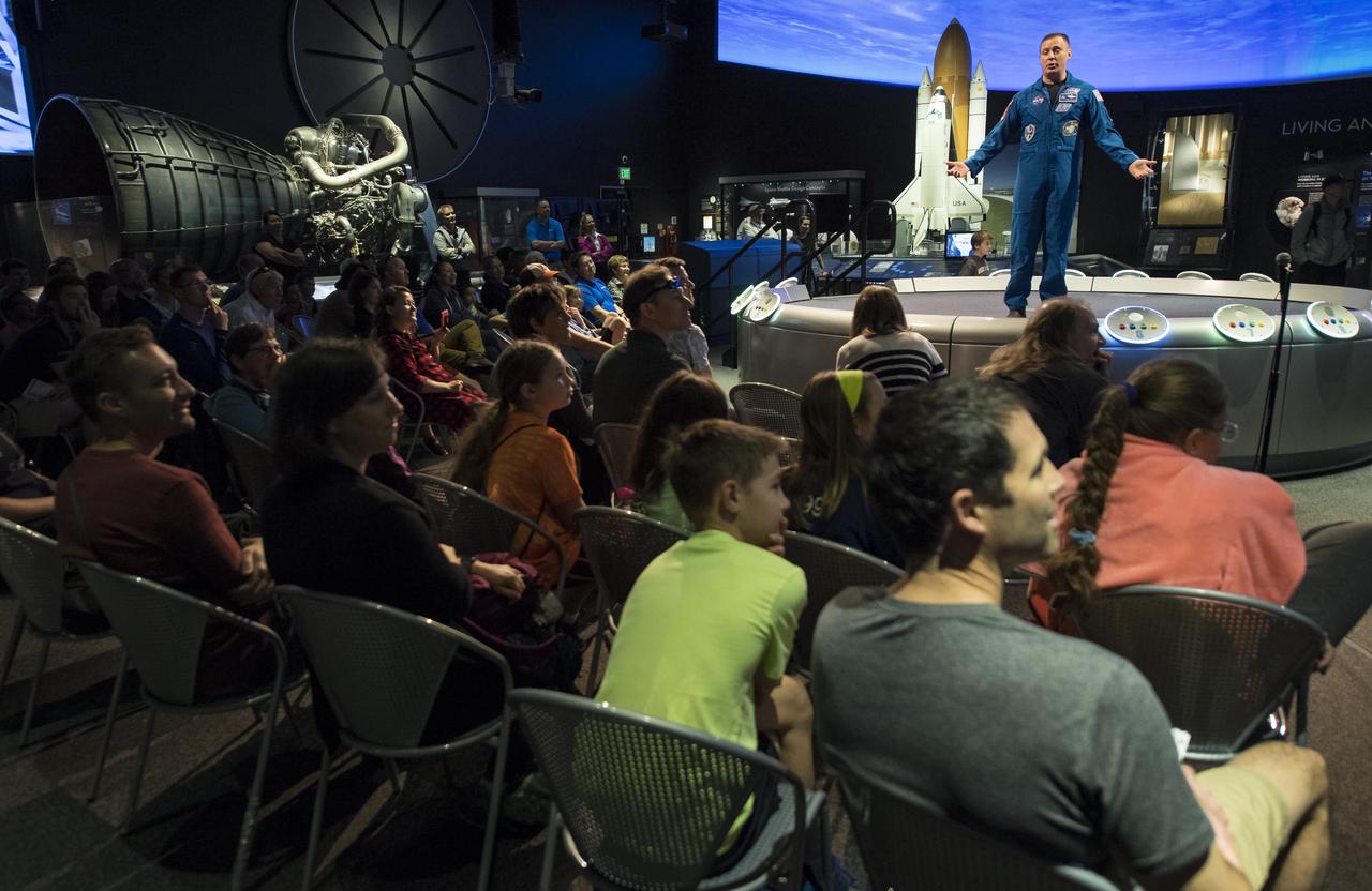 NASA astronaut Jack Fischer speaks about his time onboard the International Space Station (ISS) during Expeditions 51/52, Friday, Nov. 3, 2017 at Smithsonian's National Air and Space Museum in Washington. During Expedition 52, Fischer completed hundreds of scientific experiments and two spacewalks, and concluded his 136-day mission when he landed in a remote area near the town of Zhezkazgan, Kazakhstan in September 2017. Photo Credit: (NASA/Aubrey Gemignani)