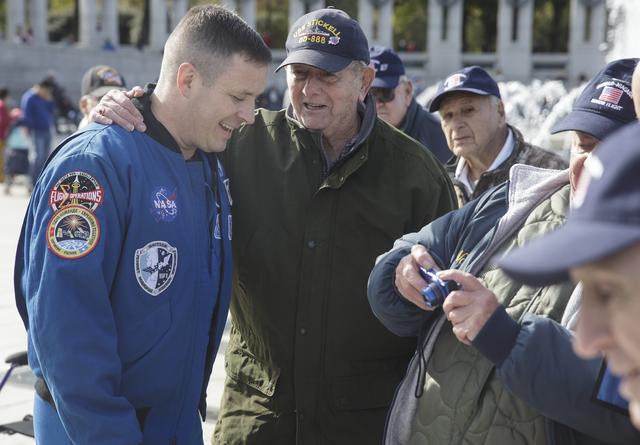 NASA image: Astronaut Jack Fischer with Honor Flight Veterans