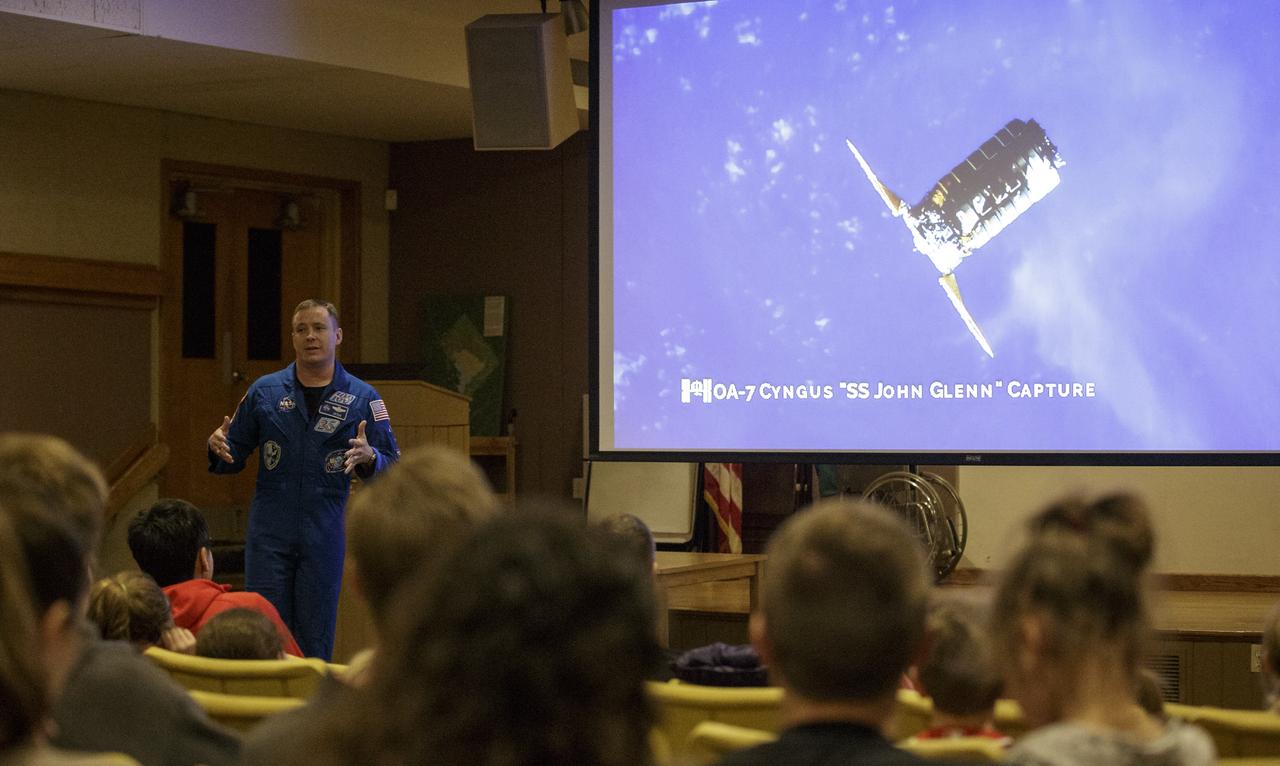 NASA astronaut Jack Fischer speaks about his time aboard the International Space Station as part of Expeditions 51 and 52, Saturday, Nov. 4, 2017 at the Rock Creek Park Nature Center and Planetarium in Washington, DC. During his 136 day mission aboard the ISS, Fischer conducted two spacewalks and hundreds of scientific experiments.  Photo Credit: (NASA/Joel Kowsky)