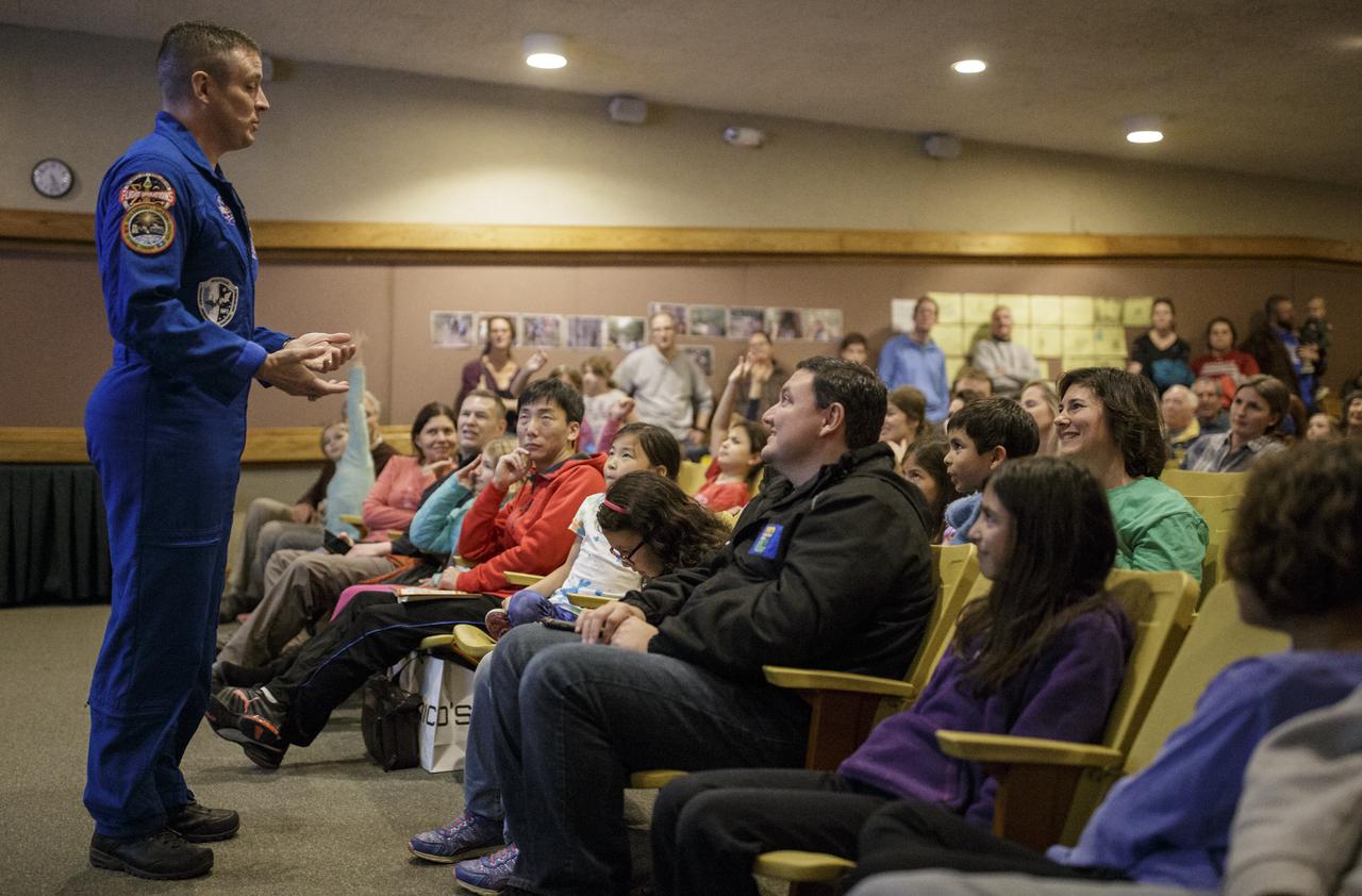 NASA astronaut Jack Fischer answers a question from the audience, Saturday, Nov. 4, 2017 at the Rock Creek Park Nature Center and Planetarium in Washington, DC. During his 136 day mission aboard the ISS, Fischer conducted two spacewalks and hundreds of scientific experiments.  Photo Credit: (NASA/Joel Kowsky)