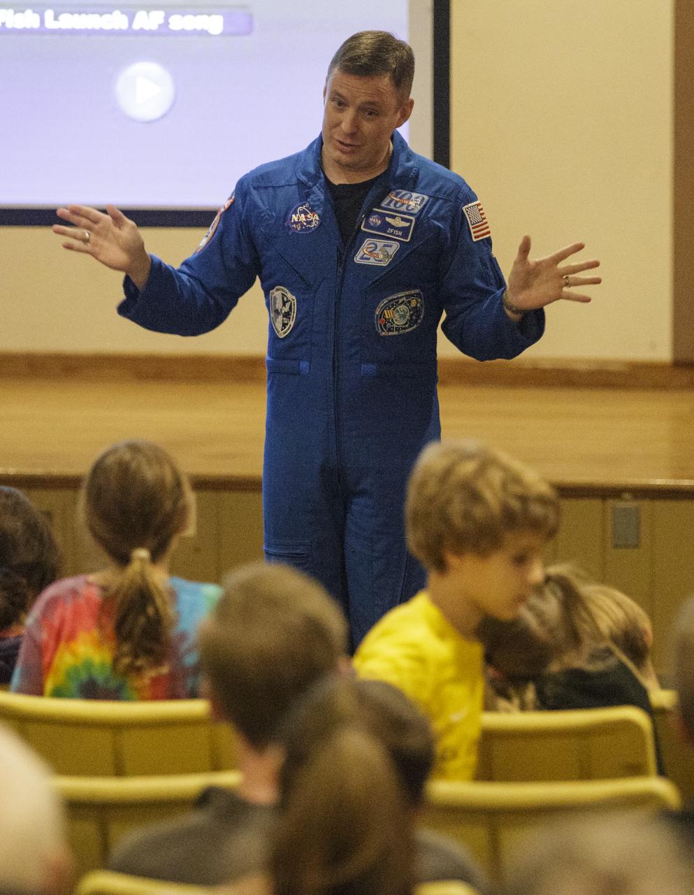 NASA astronaut Jack Fischer speaks about his time aboard the International Space Station as part of Expeditions 51 and 52, Saturday, Nov. 4, 2017 at the Rock Creek Park Nature Center and Planetarium in Washington, DC. During his 136 day mission aboard the ISS, Fischer conducted two spacewalks and hundreds of scientific experiments.  Photo Credit: (NASA/Joel Kowsky)