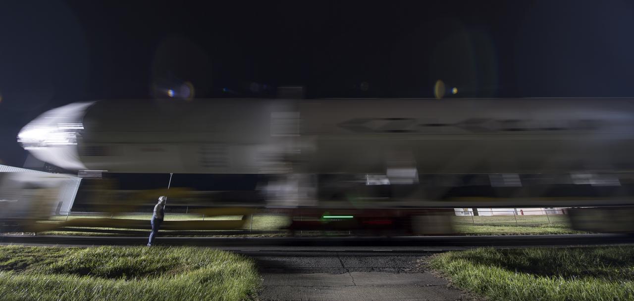 The Orbital ATK Antares rocket is rolled from the Horizontal Integration Facility (HIF) to launch Pad-0A, Thursday, Nov. 9, 2017 at NASA's Wallops Flight Facility in Virginia. Orbital ATK’s eighth contracted cargo resupply mission with NASA to the International Space Station will deliver over 7,400 pounds of science and research, crew supplies and vehicle hardware to the orbital laboratory and its crew. Photo Credit: (NASA/Bill Ingalls)