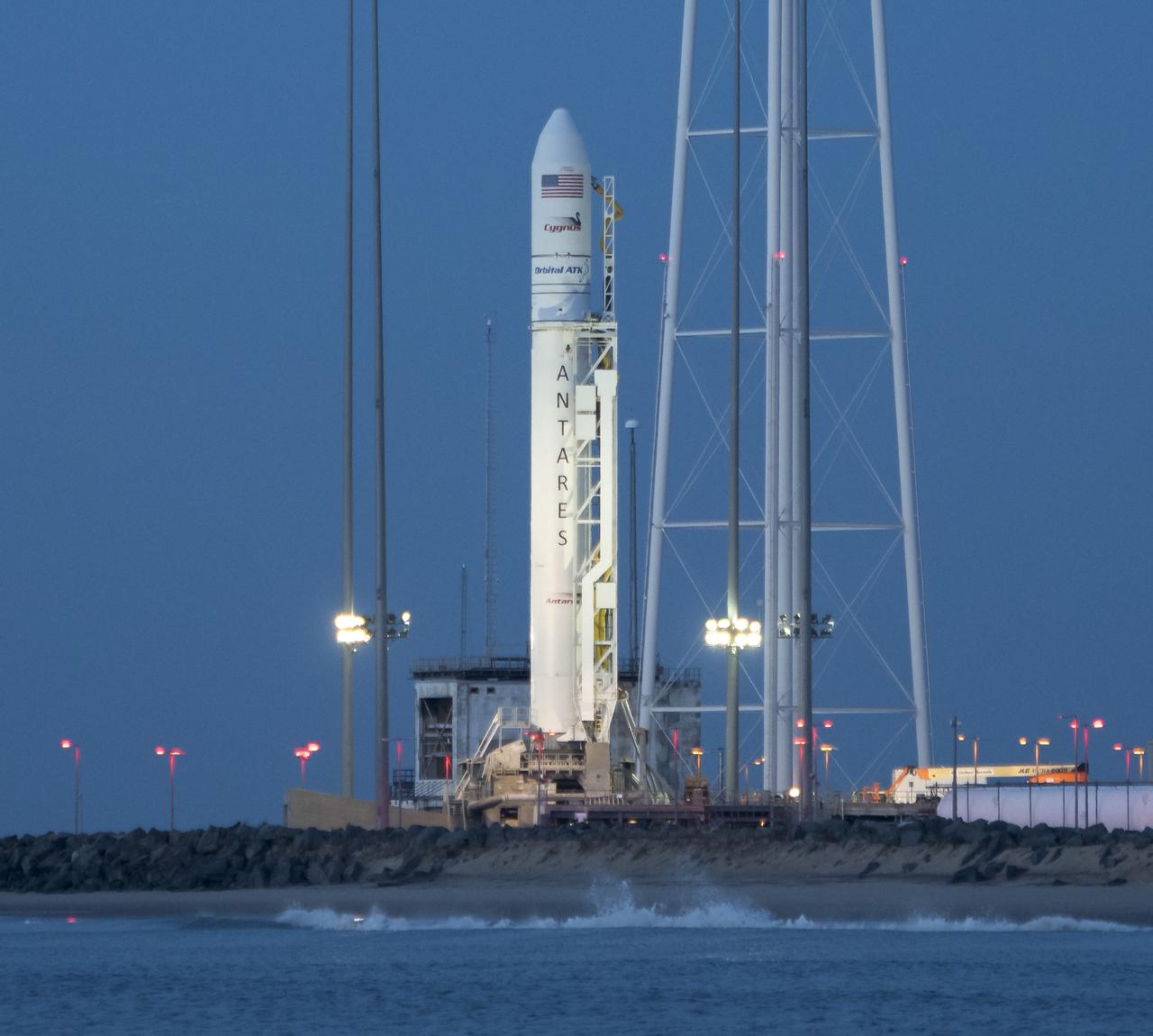 The Orbital ATK Antares rocket, with the Cygnus spacecraft onboard, is seen on launch Pad-0A, Friday, Nov. 10, 2017 at NASA's Wallops Flight Facility in Virginia. Orbital ATK’s eighth contracted cargo resupply mission with NASA to the International Space Station will deliver approximately 7,400 pounds of science and research, crew supplies and vehicle hardware to the orbital laboratory and its crew. Photo Credit: (NASA/Bill Ingalls)