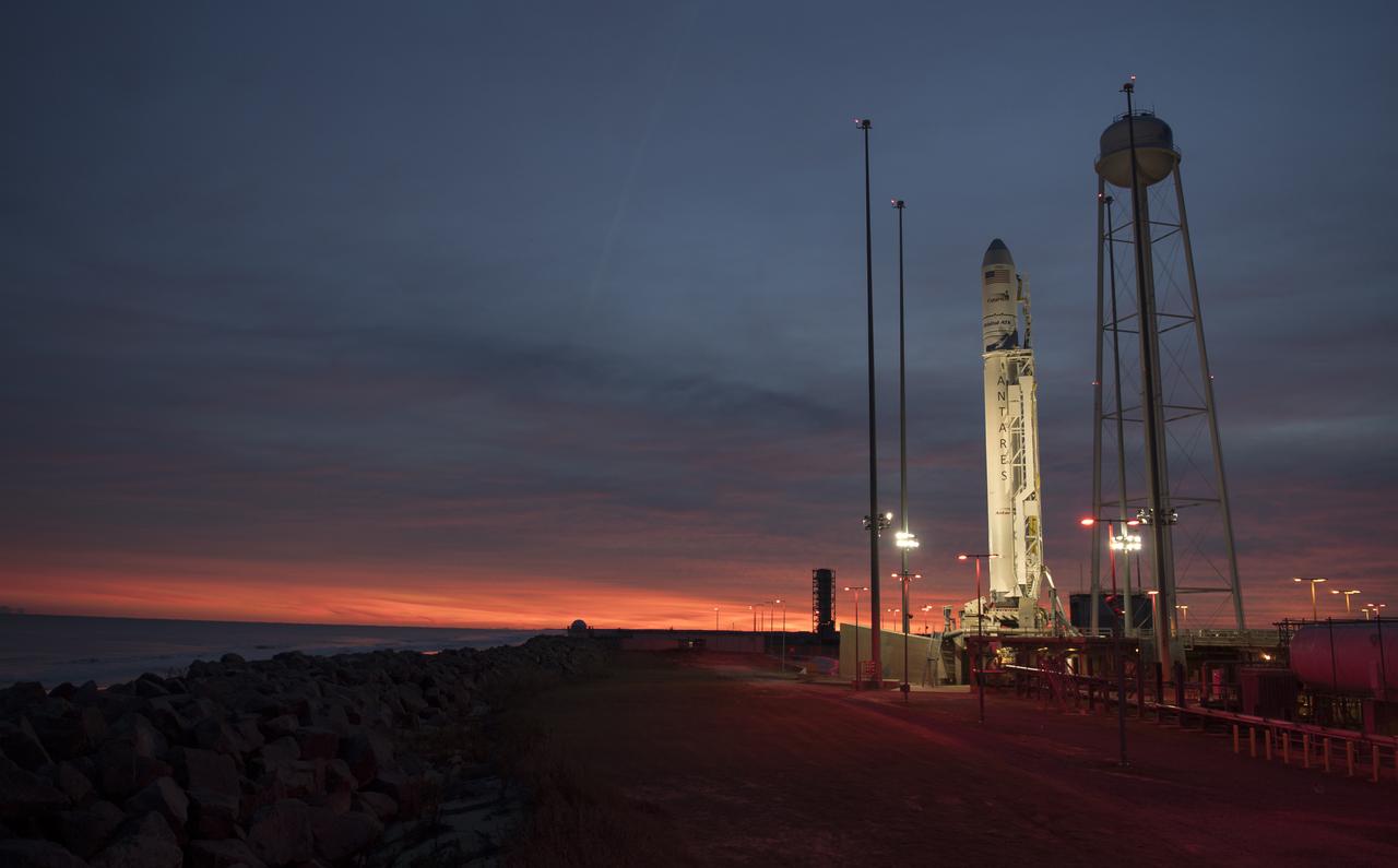 The Orbital ATK Antares rocket, with the Cygnus spacecraft onboard, is seen on launch Pad-0A, Saturday, Nov. 11, 2017 at NASA's Wallops Flight Facility in Virginia. Orbital ATK’s eighth contracted cargo resupply mission with NASA to the International Space Station will deliver approximately 7,400 pounds of science and research, crew supplies and vehicle hardware to the orbital laboratory and its crew. Photo Credit: (NASA/Bill Ingalls)