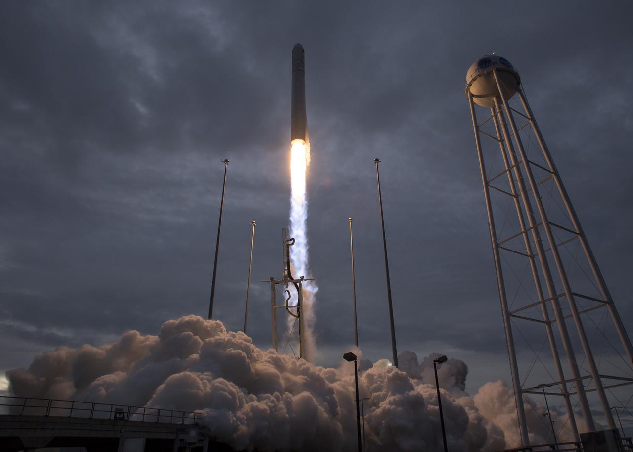 The Orbital ATK Antares rocket, with the Cygnus spacecraft onboard, launches from Pad-0A, Sunday, Nov. 12, 2017 at NASA's Wallops Flight Facility in Virginia. Orbital ATK’s eighth contracted cargo resupply mission with NASA to the International Space Station will deliver approximately 7,400 pounds of science and research, crew supplies and vehicle hardware to the orbital laboratory and its crew. Photo Credit: (NASA/Bill Ingalls)