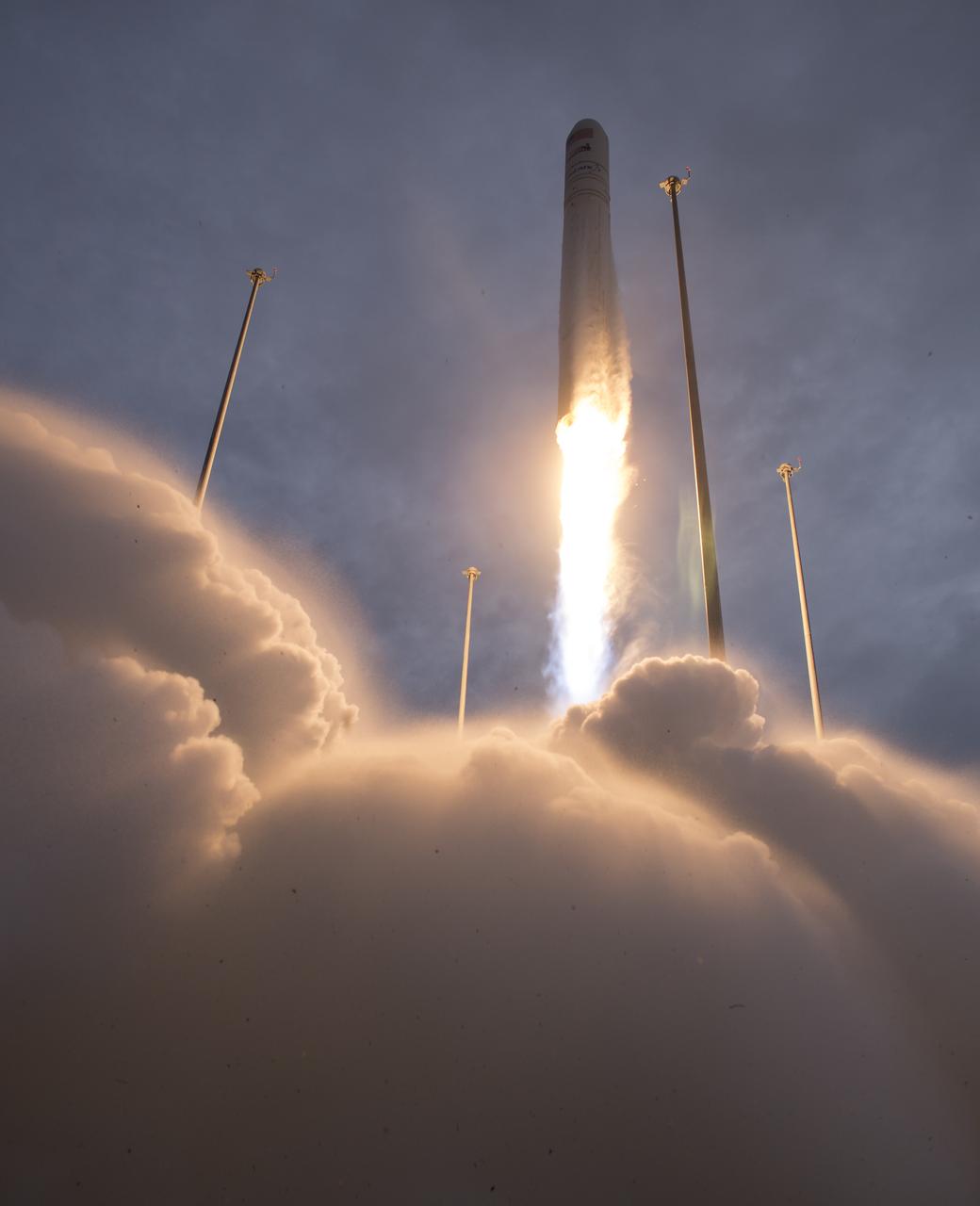 The Orbital ATK Antares rocket, with the Cygnus spacecraft onboard, launches from Pad-0A, Sunday, Nov. 12, 2017 at NASA's Wallops Flight Facility in Virginia. Orbital ATK’s eighth contracted cargo resupply mission with NASA to the International Space Station will deliver approximately 7,400 pounds of science and research, crew supplies and vehicle hardware to the orbital laboratory and its crew. Photo Credit: (NASA/Bill Ingalls)