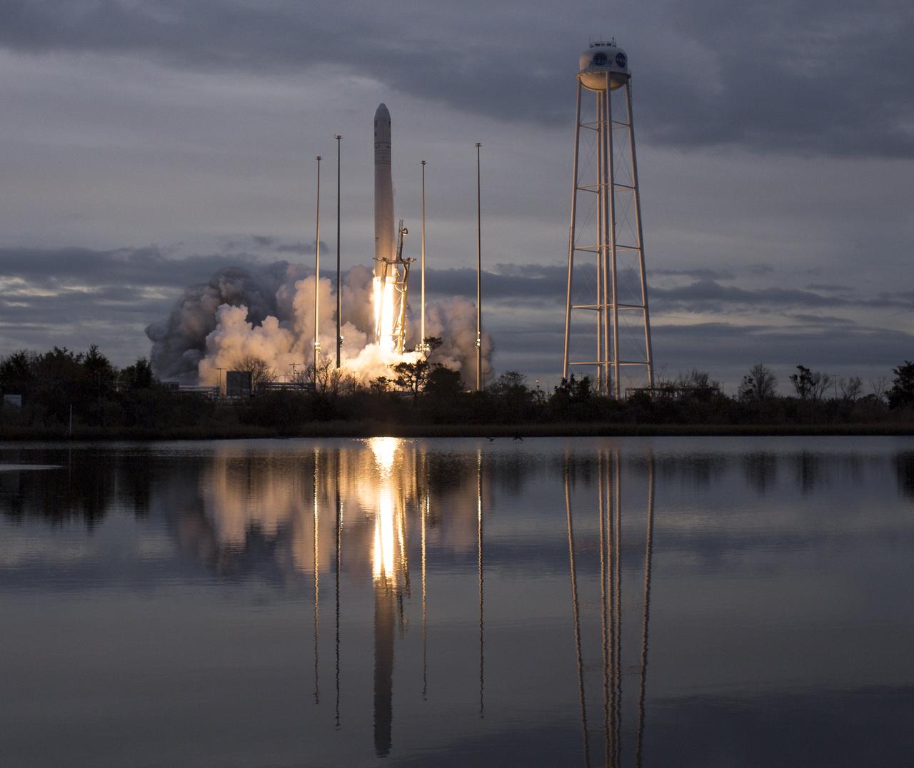 The Orbital ATK Antares rocket, with the Cygnus spacecraft onboard, launches from Pad-0A, Sunday, Nov. 12, 2017 at NASA's Wallops Flight Facility in Virginia. Orbital ATK’s eighth contracted cargo resupply mission with NASA to the International Space Station will deliver approximately 7,400 pounds of science and research, crew supplies and vehicle hardware to the orbital laboratory and its crew. Photo Credit: (NASA/Bill Ingalls)