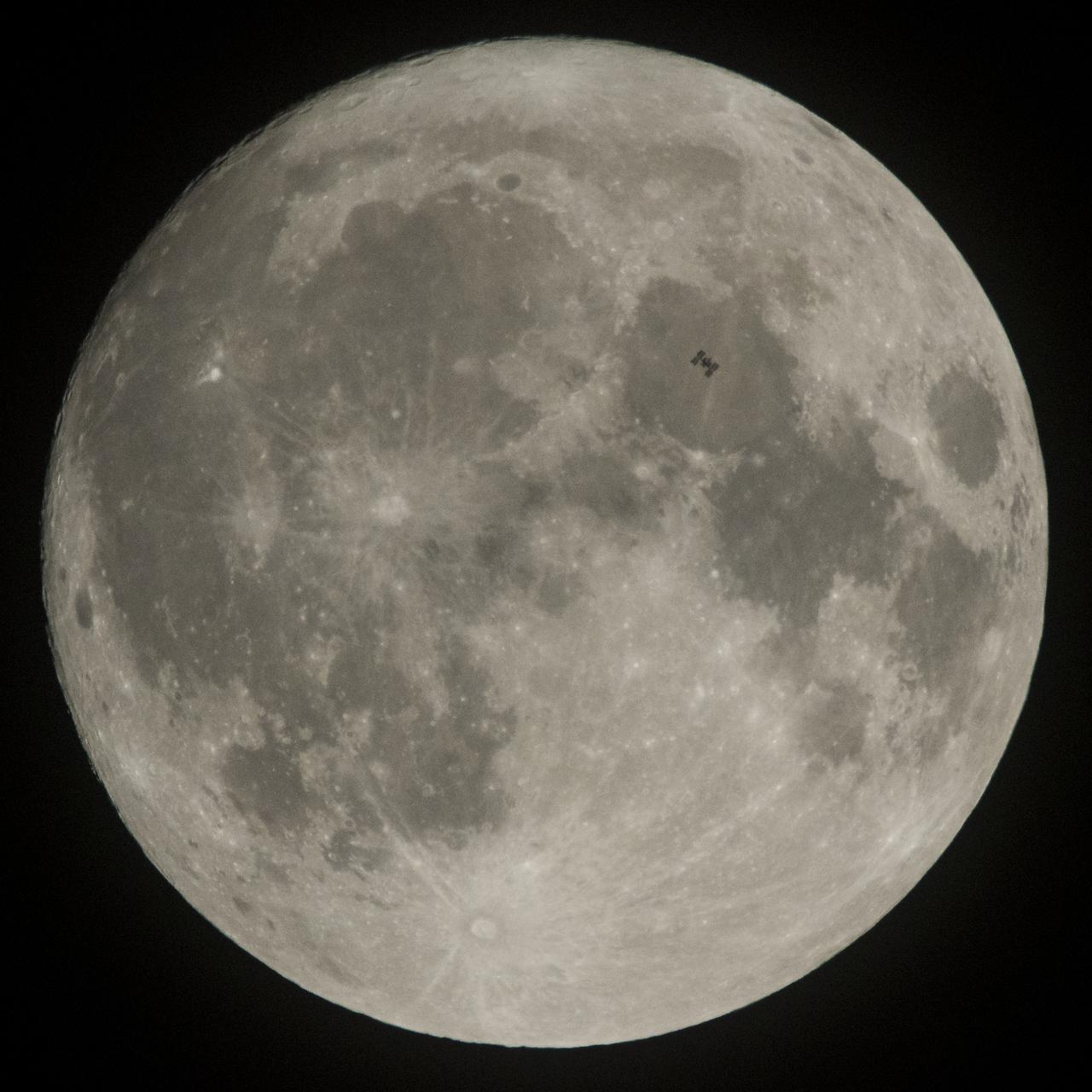 The International Space Station, with a crew of six onboard, is seen in silhouette as it transits the Moon at roughly five miles per second, Saturday, Dec. 2, 2017, in Manchester Township, York County, Pennsylvania. Onboard are NASA astronauts Joe Acaba, Mark Vande Hei, and Randy Bresnik; Russian cosmonauts Alexander Misurkin and Sergey Ryanzansky; and ESA astronaut Paolo Nespoli. Photo Credit: (NASA/Joel Kowsky)