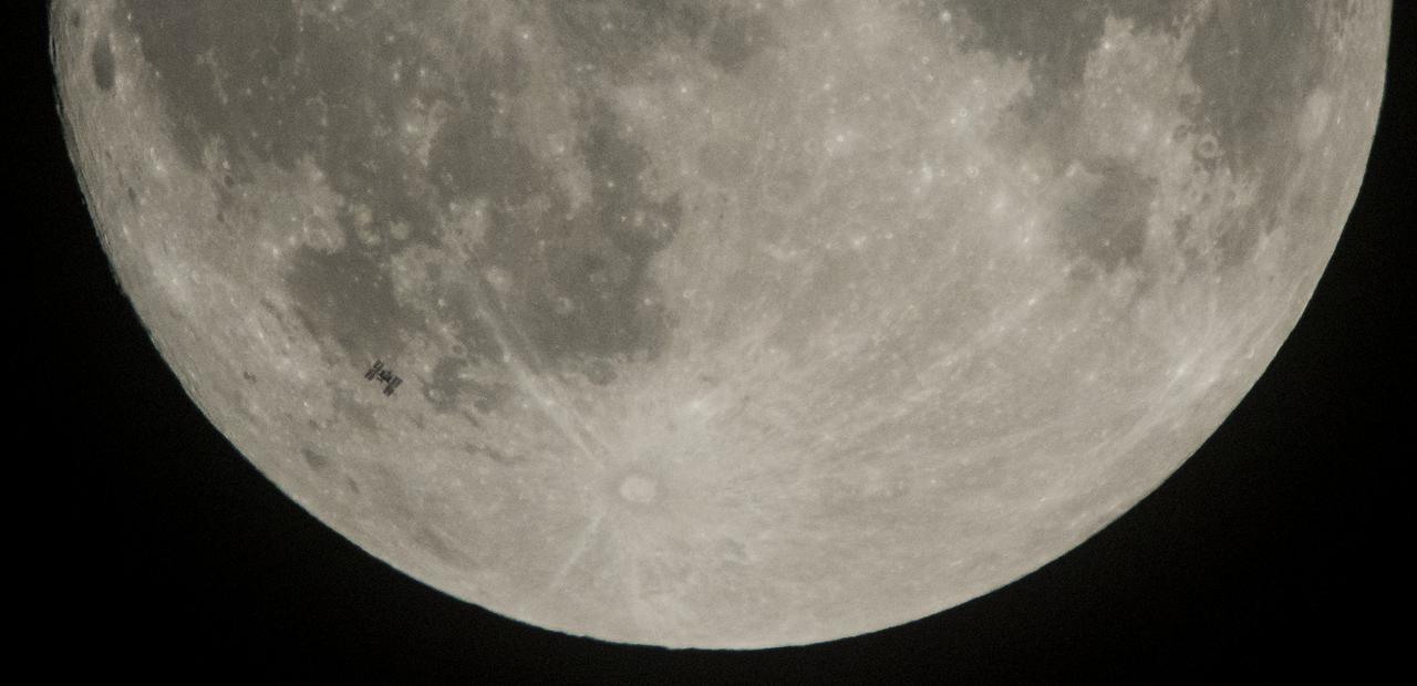 The International Space Station, with a crew of six onboard, is seen in silhouette as it transits the Moon at roughly five miles per second, Saturday, Dec. 2, 2017, in Manchester Township, York County, Pennsylvania. Onboard are NASA astronauts Joe Acaba, Mark Vande Hei, and Randy Bresnik; Russian cosmonauts Alexander Misurkin and Sergey Ryanzansky; and ESA astronaut Paolo Nespoli. Photo Credit: (NASA/Joel Kowsky)