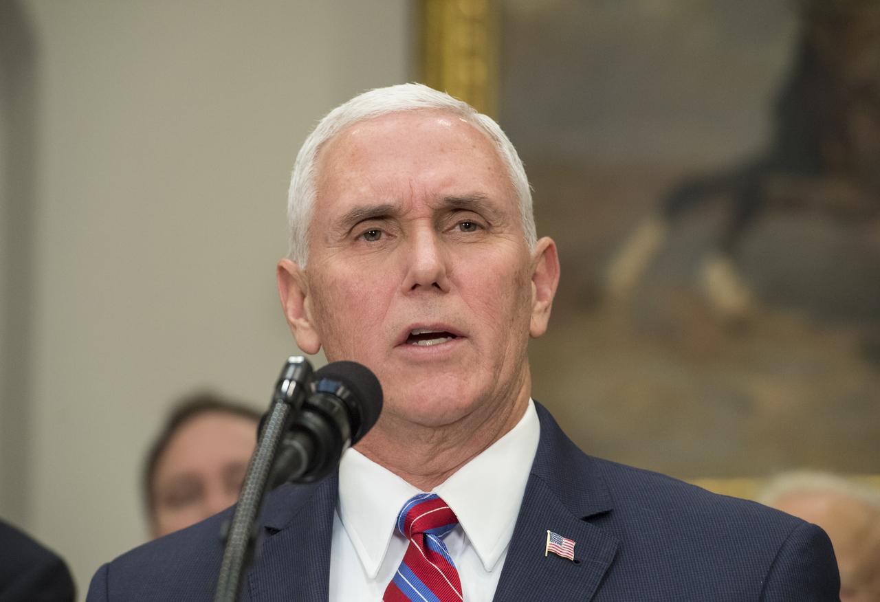 Vice President Mike Pence speaks before President Donald Trump signs Space Policy Directive - 1, directing NASA to return to the moon, alongside members of the Senate, Congress, NASA, and commercial space companies in the Roosevelt room of the White House in Washington, Monday, Dec. 11, 2017. Photo Credit: (NASA/Aubrey Gemignani)