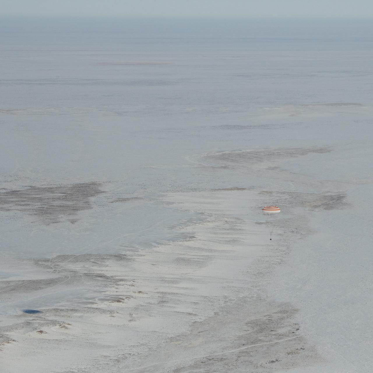 The Soyuz MS-05 spacecraft is seen as it lands with Expedition 53 Commander Randy Bresnik of NASA and Flight Engineers Paolo Nespoli of ESA (European Space Agency) and Sergey Ryazanskiy of the Russian space agency Roscosmos near the town of Zhezkazgan, Kazakhstan on Thursday, Dec. 14, 2017. Bresnik, Nespoli and Ryazanskiy are returning after 139 days in space where they served as members of the Expedition 52 and 53 crews onboard the International Space Station. Photo Credit: (NASA/Bill Ingalls)