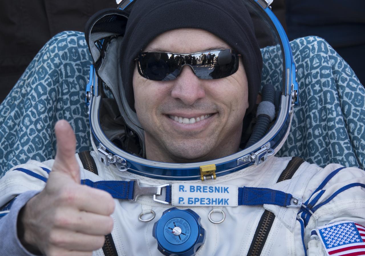 NASA astronaut Randy Bresnik rests in a chair shortly after he and ESA (European Space Agency) astronaut Paolo Nespoli, and Roscosmos cosmonaut Sergey Ryazanskiy landed in their Soyuz MS-05 spacecraft in a remote area near the town of Zhezkazgan, Kazakhstan on Thursday, Dec. 14, 2017. Bresnik, Nespoli and Ryazanskiy are returning after 139 days in space where they served as members of the Expedition 52 and 53 crews onboard the International Space Station. Photo Credit: (NASA/Bill Ingalls)