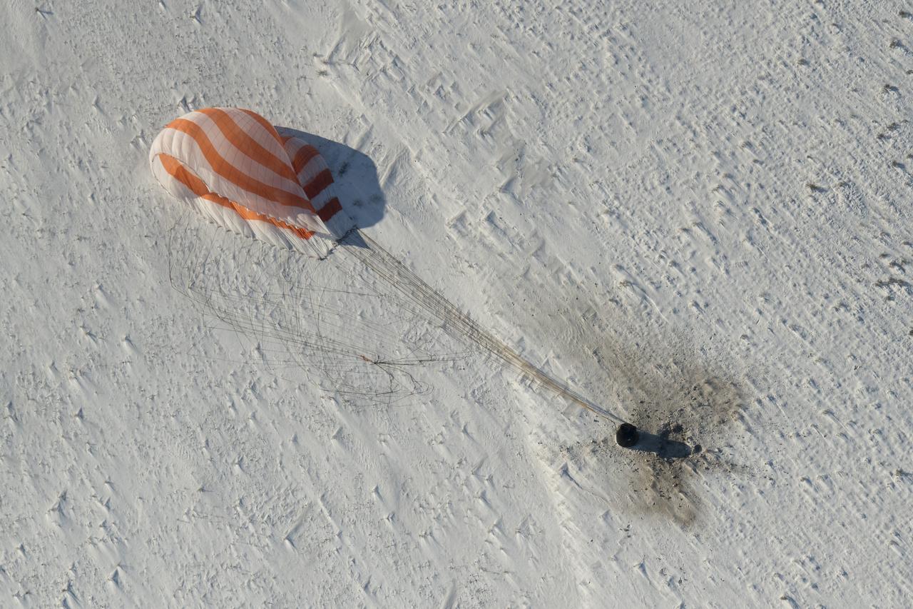 The Soyuz MS-05 spacecraft is seen as it lands with Expedition 53 Commander Randy Bresnik of NASA and Flight Engineers Paolo Nespoli of ESA (European Space Agency) and Sergey Ryazanskiy of the Russian space agency Roscosmos near the town of Zhezkazgan, Kazakhstan on Thursday, Dec. 14, 2017. Bresnik, Nespoli and Ryazanskiy are returning after 139 days in space where they served as members of the Expedition 52 and 53 crews onboard the International Space Station. Photo Credit: (NASA/Bill Ingalls)