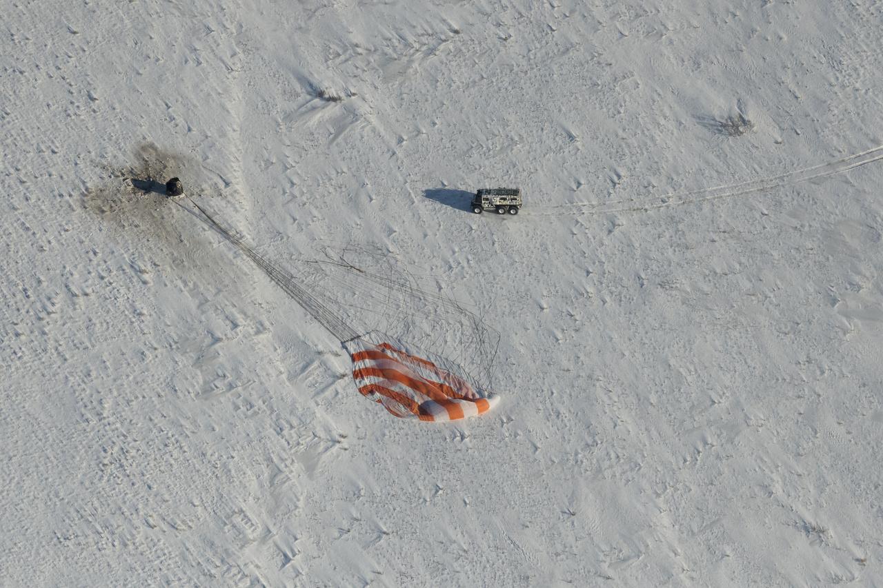 Russian Search and Rescue teams arrive at the Soyuz MS-05 spacecraft shortly after it landed with Expedition 53 Commander Randy Bresnik of NASA and Flight Engineers Paolo Nespoli of ESA (European Space Agency) and Sergey Ryazanskiy of the Russian space agency Roscosmos near the town of Zhezkazgan, Kazakhstan on Thursday, Dec. 14, 2017. Bresnik, Nespoli and Ryazanskiy are returning after 139 days in space where they served as members of the Expedition 52 and 53 crews onboard the International Space Station. Photo Credit: (NASA/Bill Ingalls)