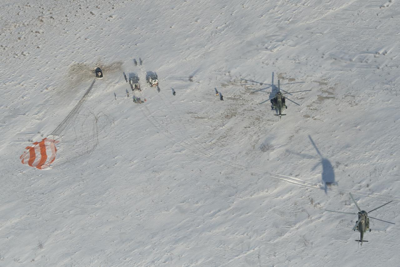 Russian Search and Rescue teams arrive at the Soyuz MS-05 spacecraft shortly after it landed with Expedition 53 Commander Randy Bresnik of NASA and Flight Engineers Paolo Nespoli of ESA (European Space Agency) and Sergey Ryazanskiy of the Russian space agency Roscosmos near the town of Zhezkazgan, Kazakhstan on Thursday, Dec. 14, 2017. Bresnik, Nespoli and Ryazanskiy are returning after 139 days in space where they served as members of the Expedition 52 and 53 crews onboard the International Space Station. Photo Credit: (NASA/Bill Ingalls)