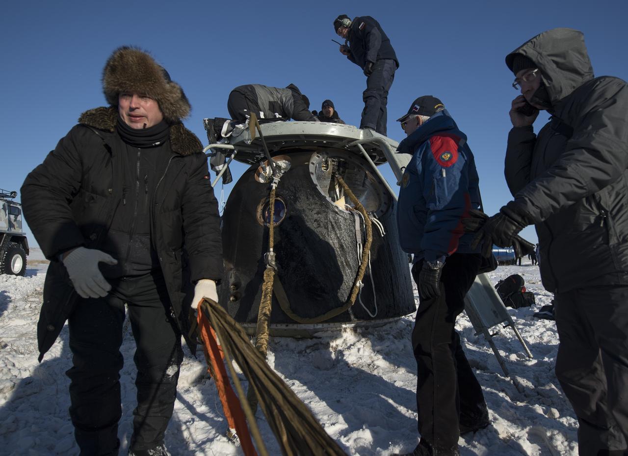 Russian Search and Rescue teams arrive at the Soyuz MS-05 spacecraft shortly after it landed with Expedition 53 Commander Randy Bresnik of NASA and Flight Engineers Paolo Nespoli of ESA (European Space Agency) and Sergey Ryazanskiy of the Russian space agency Roscosmos near the town of Zhezkazgan, Kazakhstan on Thursday, Dec. 14, 2017. Bresnik, Nespoli and Ryazanskiy are returning after 139 days in space where they served as members of the Expedition 52 and 53 crews onboard the International Space Station. Photo Credit: (NASA/Bill Ingalls)