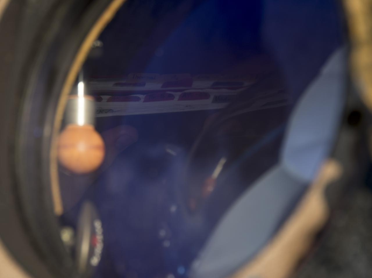 Expedition 53 Commander Randy Bresnik of NASA is seen holding documents inside the Soyuz Capsule after having landed with Flight Engineers Paolo Nespoli of ESA (European Space Agency) and Sergey Ryazanskiy of the Russian space agency Roscosmos near the town of Zhezkazgan, Kazakhstan on Thursday, Dec. 14, 2017. Bresnik, Nespoli and Ryazanskiy are returning after 139 days in space where they served as members of the Expedition 52 and 53 crews onboard the International Space Station. Photo Credit: (NASA/Bill Ingalls)