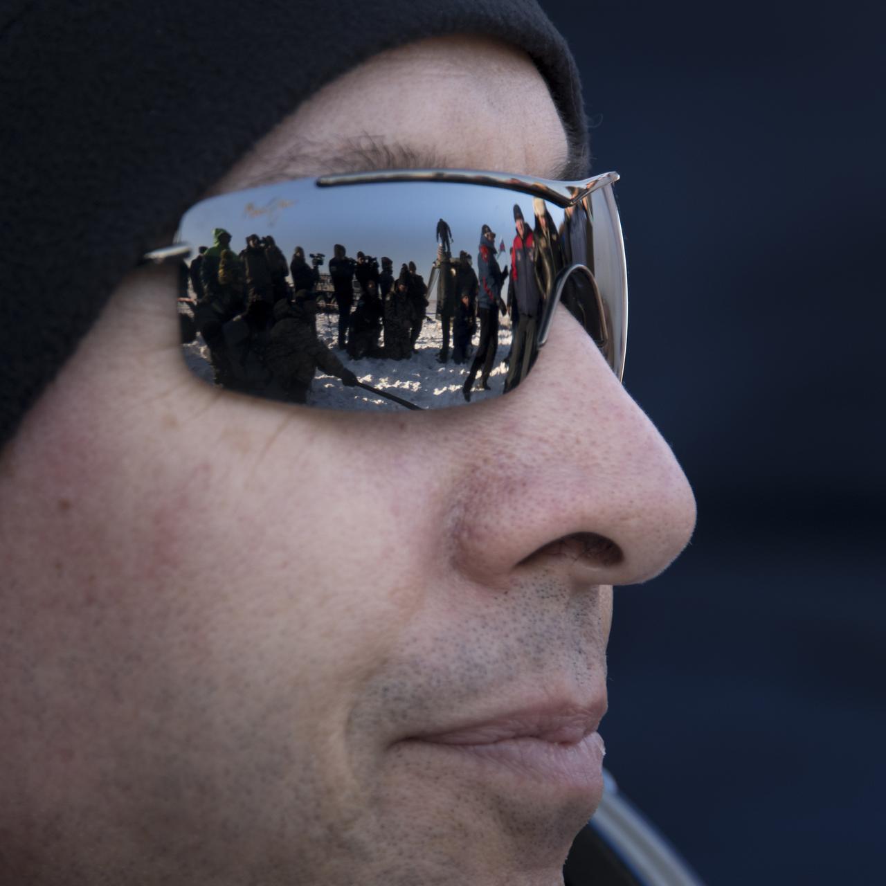 NASA astronaut Randy Bresnik rests in a chair shortly after he and ESA (European Space Agency) astronaut Paolo Nespoli, and Roscosmos cosmonaut Sergey Ryazanskiy landed in their Soyuz MS-05 spacecraft in a remote area near the town of Zhezkazgan, Kazakhstan on Thursday, Dec. 14, 2017. Bresnik, Nespoli and Ryazanskiy are returning after 139 days in space where they served as members of the Expedition 52 and 53 crews onboard the International Space Station. Photo Credit: (NASA/Bill Ingalls)