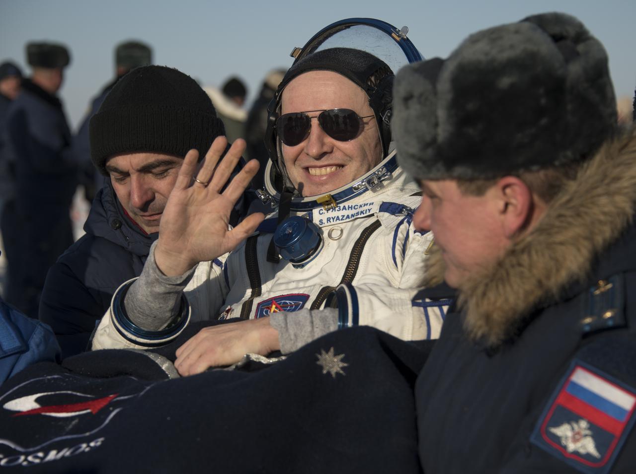 Roscosmos cosmonaut Sergey Ryazanskiy is carried to the medical tent shortly after he and NASA astronaut Randy Bresnik, and ESA (European Space Agency) astronaut Paolo Nespoli landed in their Soyuz MS-05 spacecraft in a remote area near the town of Zhezkazgan, Kazakhstan on Thursday, Dec. 14, 2017. Bresnik, Nespoli and Ryazanskiy are returning after 139 days in space where they served as members of the Expedition 52 and 53 crews onboard the International Space Station. Photo Credit: (NASA/Bill Ingalls)