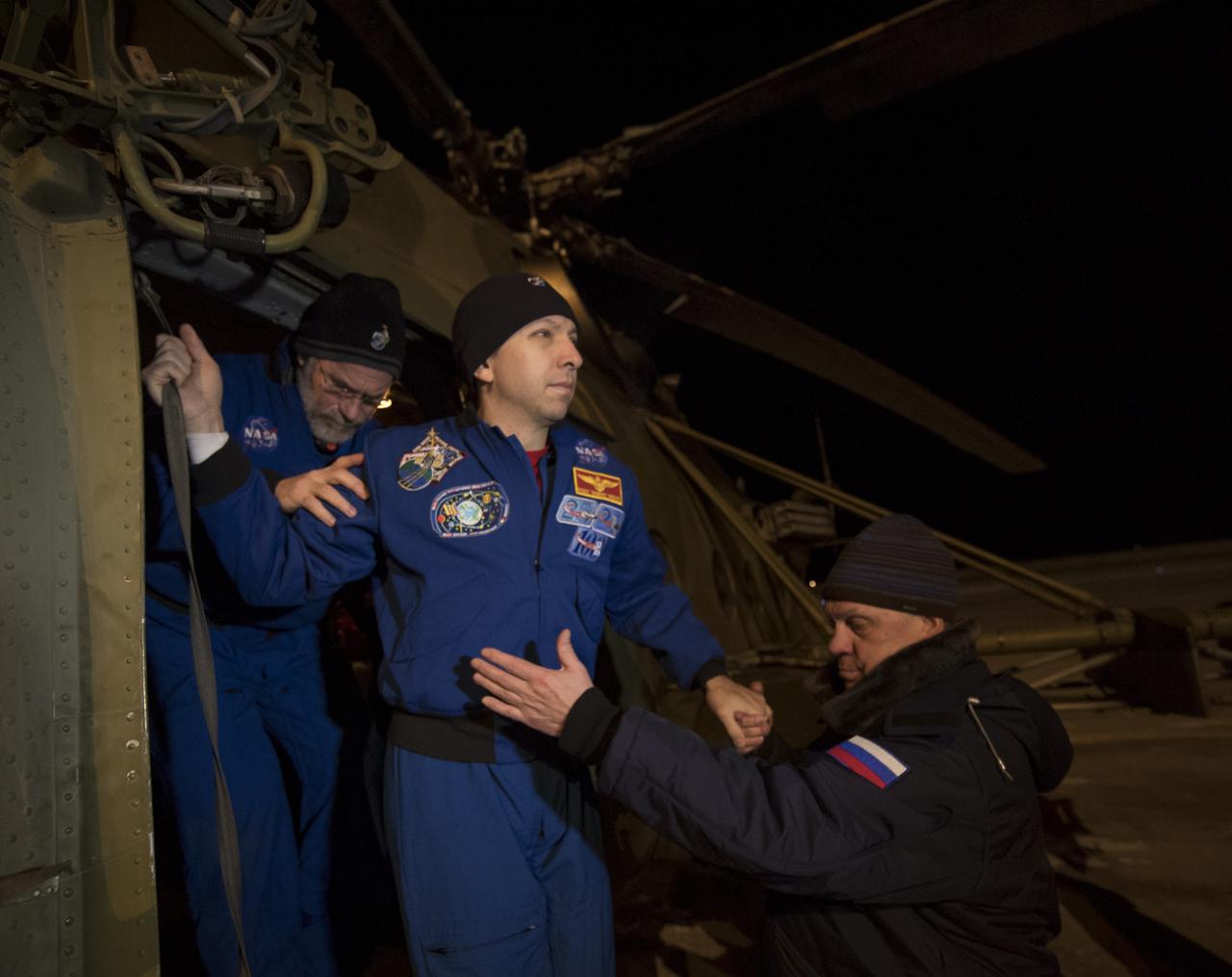 NASA astronaut Randy Bresnik arrives at the Karaganda Airport in Kazakhstan airport after he, ESA (European Space Agency) astronaut Paolo Nespoli and, Roscosmos cosmonaut Sergey Ryazanskiy landed in their Soyuz MS-05 spacecraft in a remote area near the town of Zhezkazgan, Kazakhstan on Thursday, Dec. 14, 2017. Bresnik, Nespoli and Ryazanskiy are returning after 139 days in space where they served as members of the Expedition 52 and 53 crews onboard the International Space Station. Photo Credit: (NASA/Bill Ingalls)