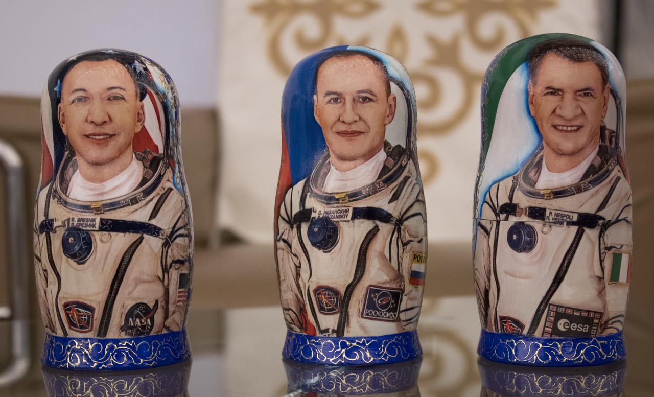Matryoshka Dolls depicting Expedition 53 Commander Randy Bresnik of NASA, left, Sergey Ryazanskiy of the Russian space agency Roscosmos, center, and Flight Engineers Paolo Nespoli of ESA (European Space Agency) are seen at a Karaganda Airport welcome ceremony in Kazakhstan on Thursday, Dec. 14, 2017. 2017. Bresnik, Nespoli and Ryazanskiy are returning after 139 days in space where they served as members of the Expedition 52 and 53 crews onboard the International Space Station. Photo Credit: (NASA/Bill Ingalls)