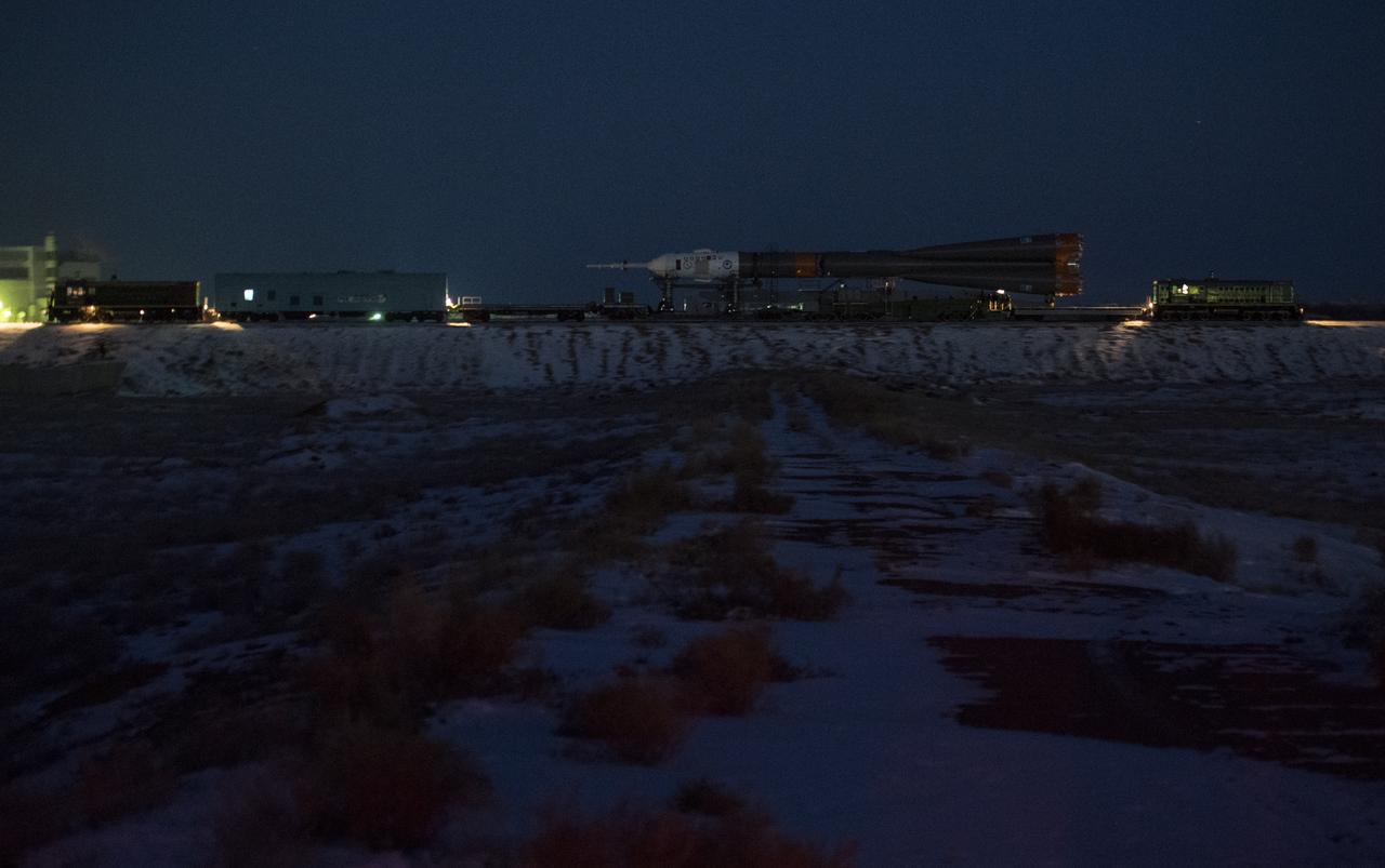 The Soyuz rocket is rolled out by train to the launch pad, Friday, Dec. 15, 2017 at the Baikonur Cosmodrome in Kazakhstan. Expedition 54 Soyuz Commander Anton Shkaplerov of Roscosmos, flight engineer Scott Tingle of NASA, and flight engineer Norishige Kanai of the Japan Aerospace Exploration Agency (JAXA) are scheduled to launch at 2:21 a.m. Eastern Time (1:21 p.m. Baikonur time) on Dec. 17 and will spend the next five months living and working aboard the International Space Station. Photo Credit: (NASA/Joel Kowsky)