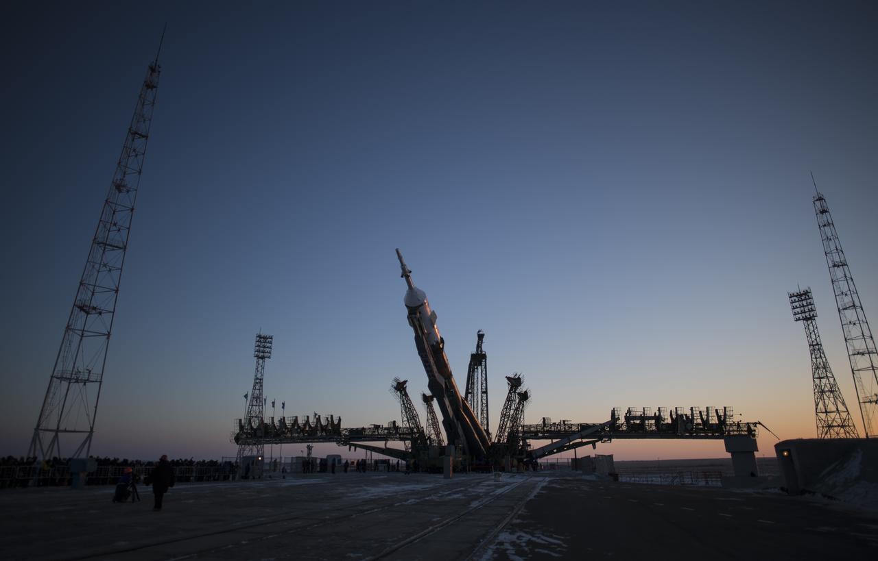 The Soyuz rocket is is seen being raised in to a vertical position on the launch pad, Friday, Dec. 15, 2017 at the Baikonur Cosmodrome in Kazakhstan. Expedition 54 Soyuz Commander Anton Shkaplerov of Roscosmos, flight engineer Scott Tingle of NASA, and flight engineer Norishige Kanai of the Japan Aerospace Exploration Agency (JAXA) are scheduled to launch at 2:21 a.m. Eastern Time (1:21 p.m. Baikonur time) on Dec. 17 and will spend the next five months living and working aboard the International Space Station.  Photo Credit: (NASA/Joel Kowsky)