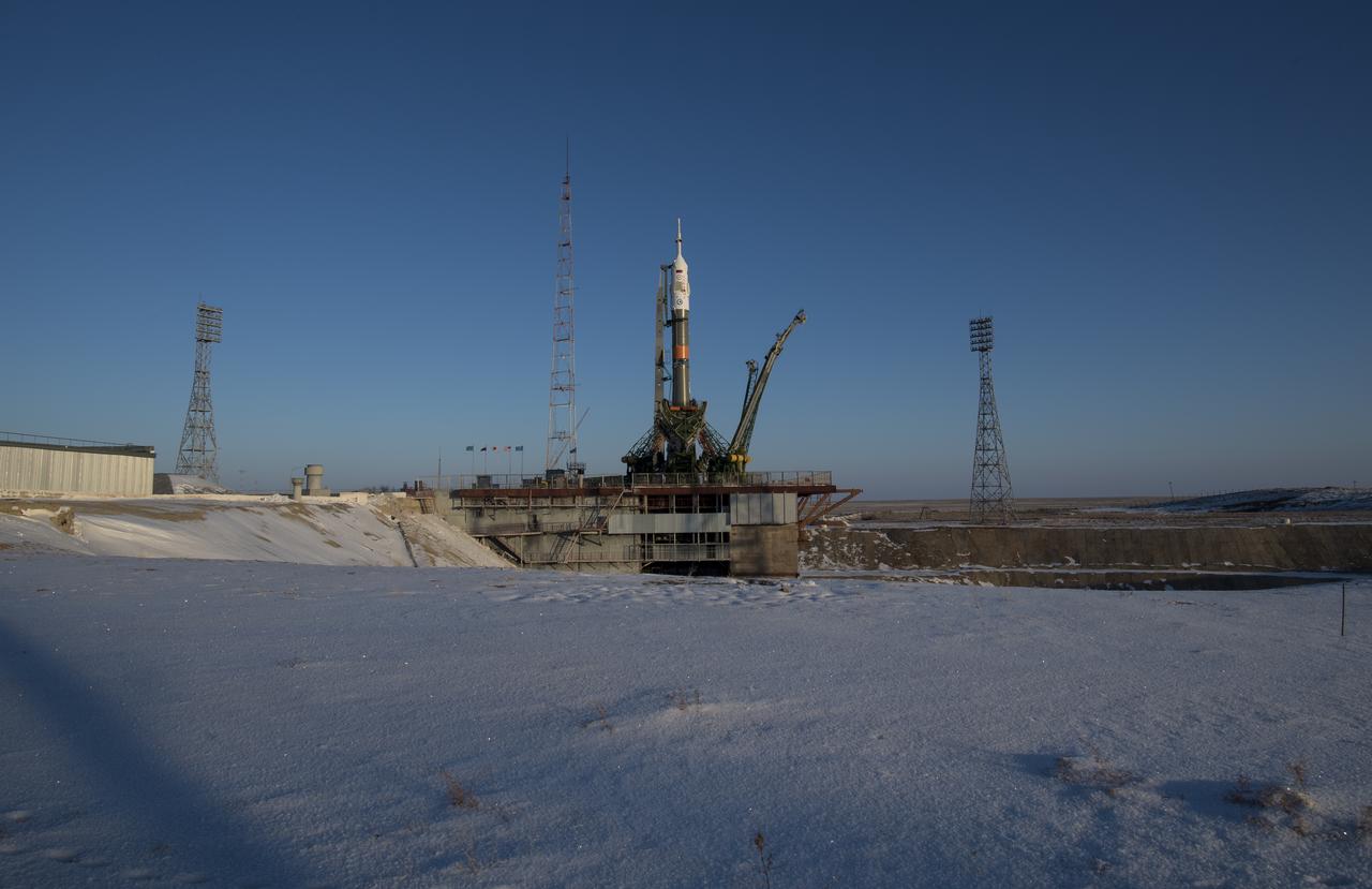 The Soyuz rocket is seen shortly after being raised into a vertical position on the launch pad, Friday, Dec. 15, 2017 at the Baikonur Cosmodrome in Kazakhstan. Expedition 54 Soyuz Commander Anton Shkaplerov of Roscosmos, flight engineer Scott Tingle of NASA, and flight engineer Norishige Kanai of the Japan Aerospace Exploration Agency (JAXA) are scheduled to launch at 2:21 a.m. Eastern Time (1:21 p.m. Baikonur time) on Dec. 17 and will spend the next five months living and working aboard the International Space Station. Photo Credit: (NASA/Joel Kowsky)