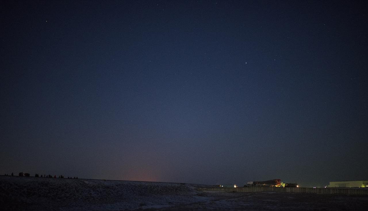 The Soyuz rocket is rolled out by train to the launch pad, Friday, Dec. 15, 2017 at the Baikonur Cosmodrome in Kazakhstan. Expedition 54 Soyuz Commander Anton Shkaplerov of Roscosmos, flight engineer Scott Tingle of NASA, and flight engineer Norishige Kanai of the Japan Aerospace Exploration Agency (JAXA) are scheduled to launch at 2:21 a.m. Eastern Time (1:21 p.m. Baikonur time) on Dec. 17 and will spend the next five months living and working aboard the International Space Station. Photo Credit: (NASA/Joel Kowsky)