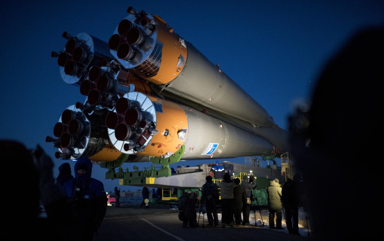 The Soyuz rocket is rolled out by train to the launch pad, Friday, Dec. 15, 2017 at the Baikonur Cosmodrome in Kazakhstan. Expedition 54 Soyuz Commander Anton Shkaplerov of Roscosmos, flight engineer Scott Tingle of NASA, and flight engineer Norishige Kanai of the Japan Aerospace Exploration Agency (JAXA) are scheduled to launch at 2:21 a.m. Eastern Time (1:21 p.m. Baikonur time) on Dec. 17 and will spend the next five months living and working aboard the International Space Station. Photo Credit: (NASA/Joel Kowsky)