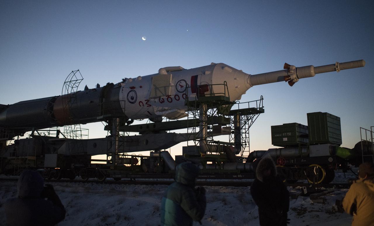 The Soyuz rocket is rolled out by train to the launch pad, Friday, Dec. 15, 2017 at the Baikonur Cosmodrome in Kazakhstan. Expedition 54 Soyuz Commander Anton Shkaplerov of Roscosmos, flight engineer Scott Tingle of NASA, and flight engineer Norishige Kanai of the Japan Aerospace Exploration Agency (JAXA) are scheduled to launch at 2:21 a.m. Eastern Time (1:21 p.m. Baikonur time) on Dec. 17 and will spend the next five months living and working aboard the International Space Station.  Photo Credit: (NASA/Joel Kowsky)