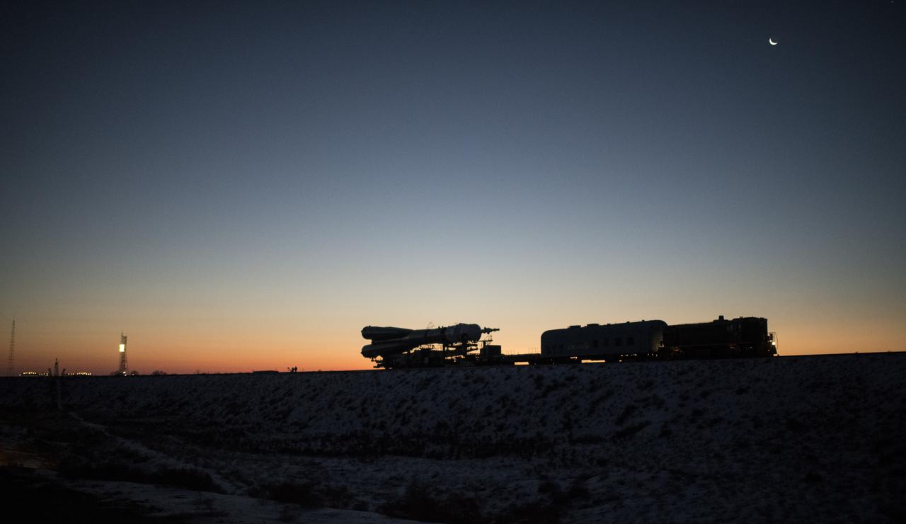 The Soyuz rocket is rolled out by train to the launch pad, Friday, Dec. 15, 2017 at the Baikonur Cosmodrome in Kazakhstan. Expedition 54 Soyuz Commander Anton Shkaplerov of Roscosmos, flight engineer Scott Tingle of NASA, and flight engineer Norishige Kanai of the Japan Aerospace Exploration Agency (JAXA) are scheduled to launch at 2:21 a.m. Eastern Time (1:21 p.m. Baikonur time) on Dec. 17 and will spend the next five months living and working aboard the International Space Station.  Photo Credit: (NASA/Joel Kowsky)