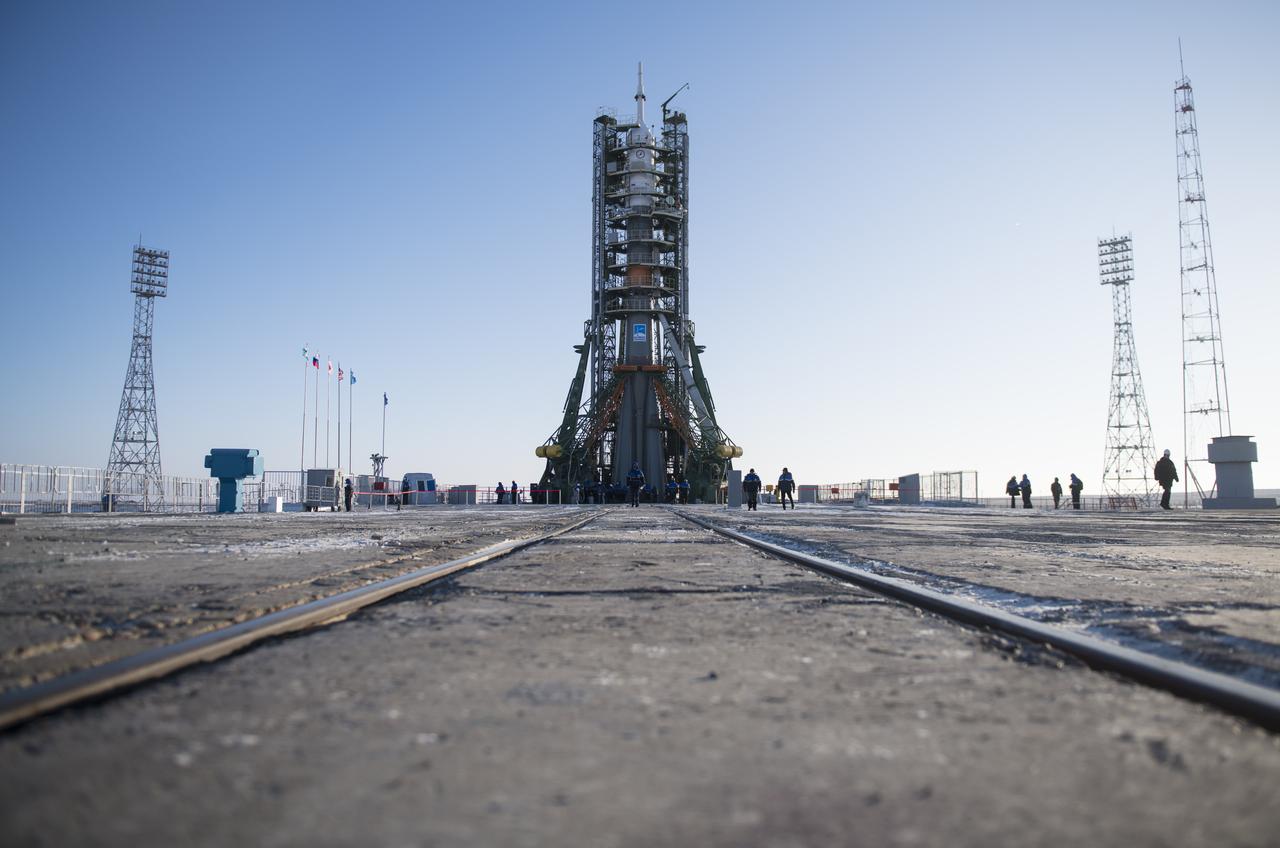 The Soyuz rocket is seen on the launch pad after the service structure arms were closed around it, Friday, Dec. 15, 2017 at the Baikonur Cosmodrome in Kazakhstan. Expedition 54 Soyuz Commander Anton Shkaplerov of Roscosmos, flight engineer Scott Tingle of NASA, and flight engineer Norishige Kanai of the Japan Aerospace Exploration Agency (JAXA) are scheduled to launch at 2:21 a.m. Eastern Time (1:21 p.m. Baikonur time) on Dec. 17 and will spend the next five months living and working aboard the International Space Station. Photo Credit: (NASA/Joel Kowsky)