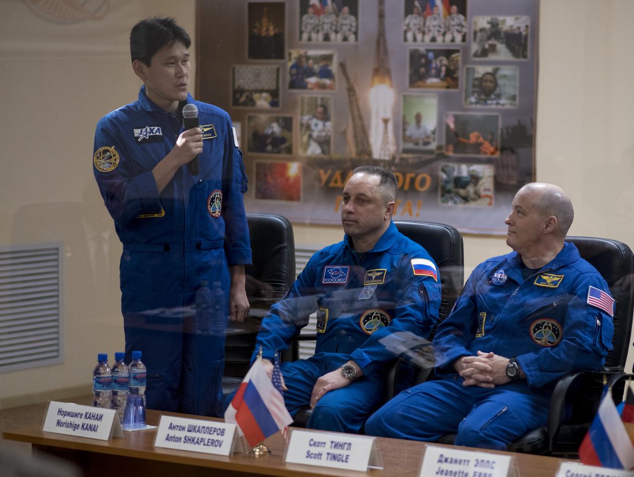 Expedition 54 flight engineer Norishige Kanai of the Japan Aerospace Exploration Agency (JAXA) speaks during the State Commission meeting to approve the Soyuz launch of Expedition 54 to the International Space Station, Saturday, Dec. 16, 2017 at the Cosmonaut Hotel in Baikonur, Kazakhstan. Kanai, Soyuz Commander Anton Shkaplerov of Roscosmos, and flight engineer Scott Tingle of NASA are scheduled to launch to the International Space Station aboard the Soyuz spacecraft from the Baikonur Cosmodrome on December 17. Photo Credit: (NASA/Joel Kowsky)