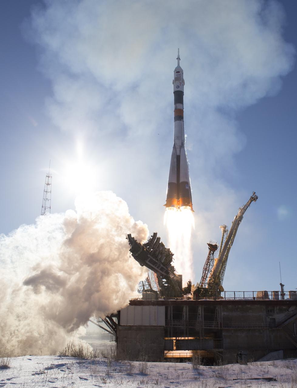 The Soyuz MS-07 rocket is launched with Expedition 54 Soyuz Commander Anton Shkaplerov of Roscosmos, flight engineer Scott Tingle of NASA, and flight engineer Norishige Kanai of Japan Aerospace Exploration Agency (JAXA), Sunday, Dec. 17, 2017 at the Baikonur Cosmodrome in Kazakhstan. Shkaplerov, Tingle, and Kanai will spend the next five months living and working aboard the International Space Station. Photo Credit: (NASA/Joel Kowsky)